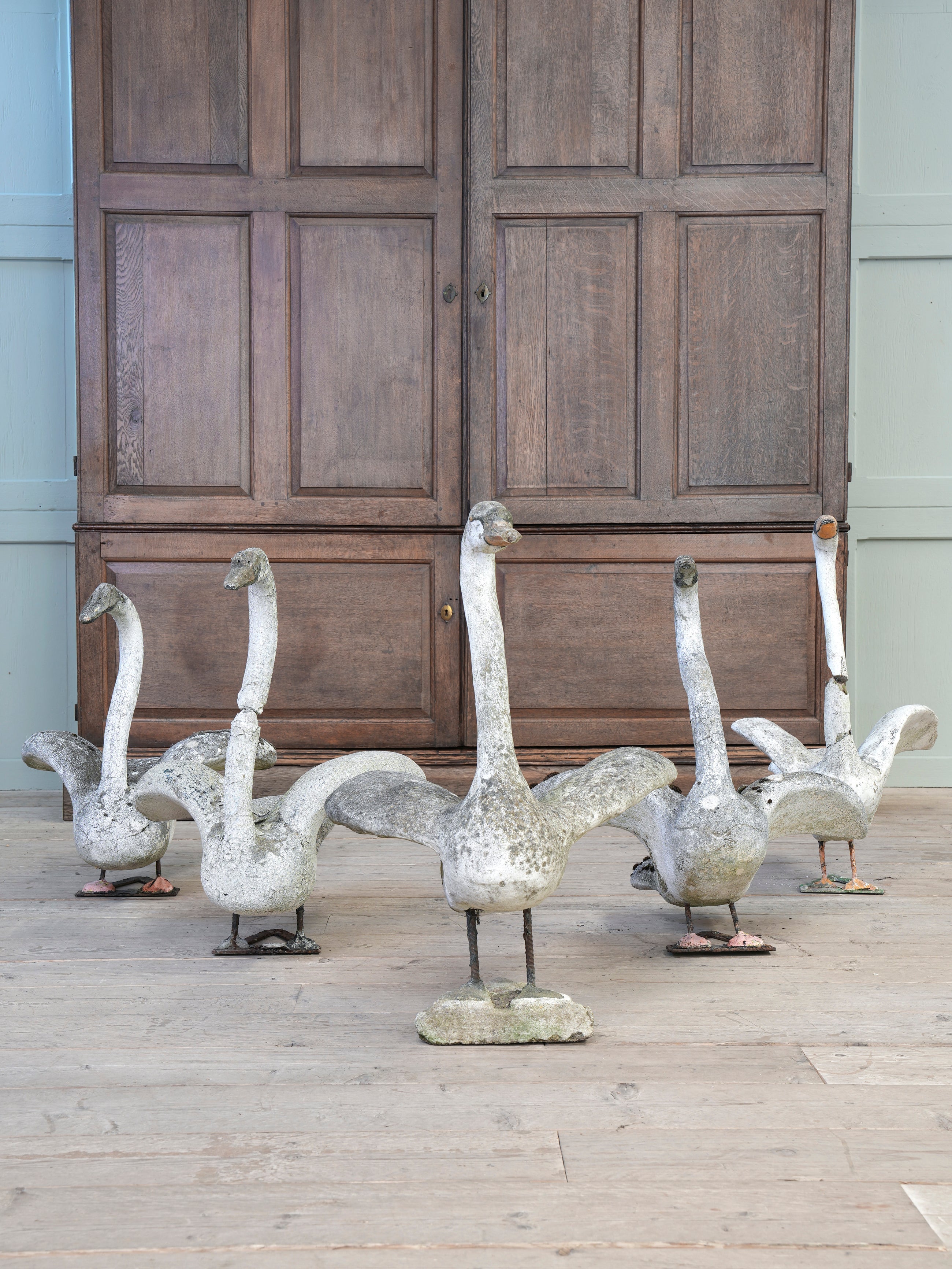 A Bevy of Composition Stone Swans
