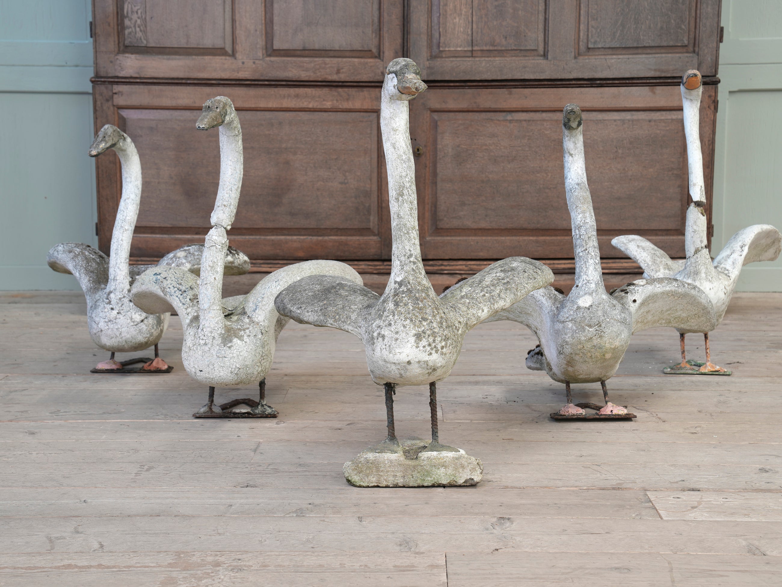 A Bevy of Composition Stone Swans