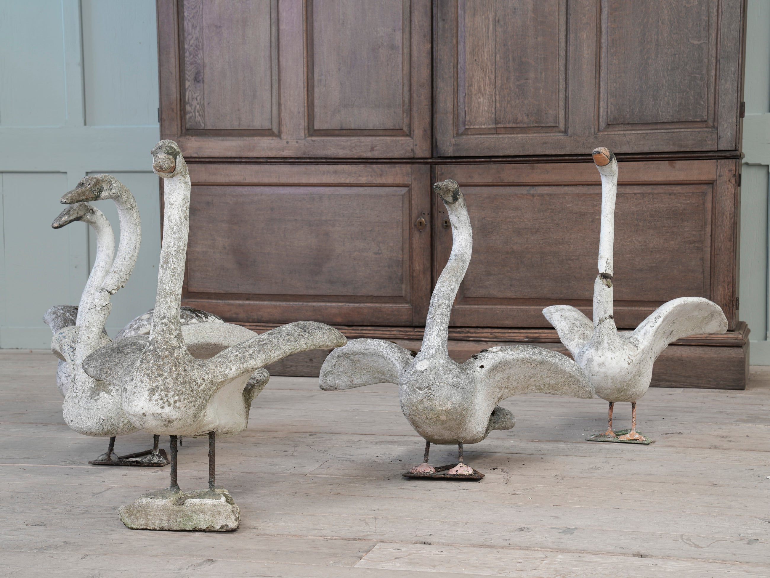 A Bevy of Composition Stone Swans