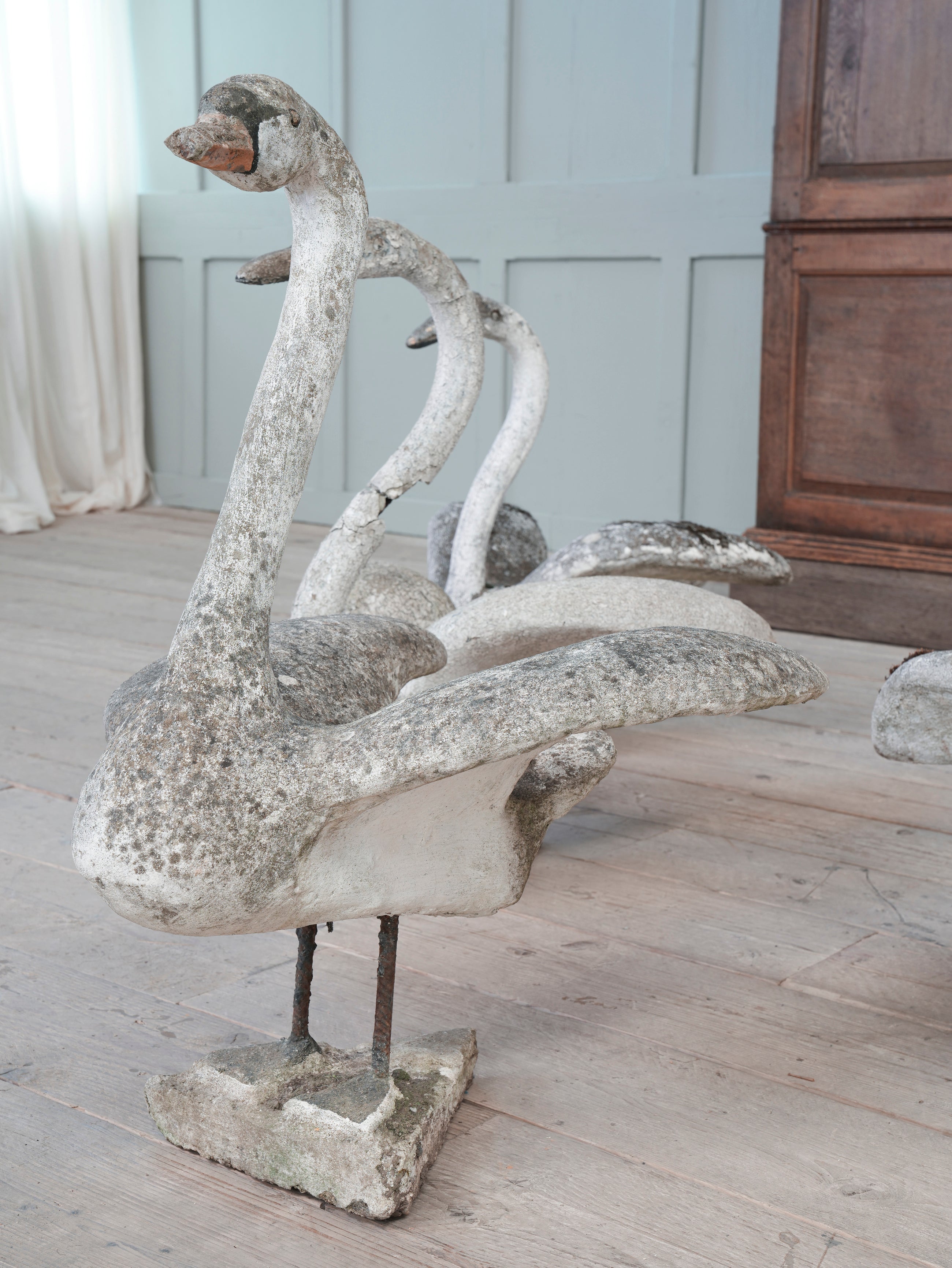 A Bevy of Composition Stone Swans