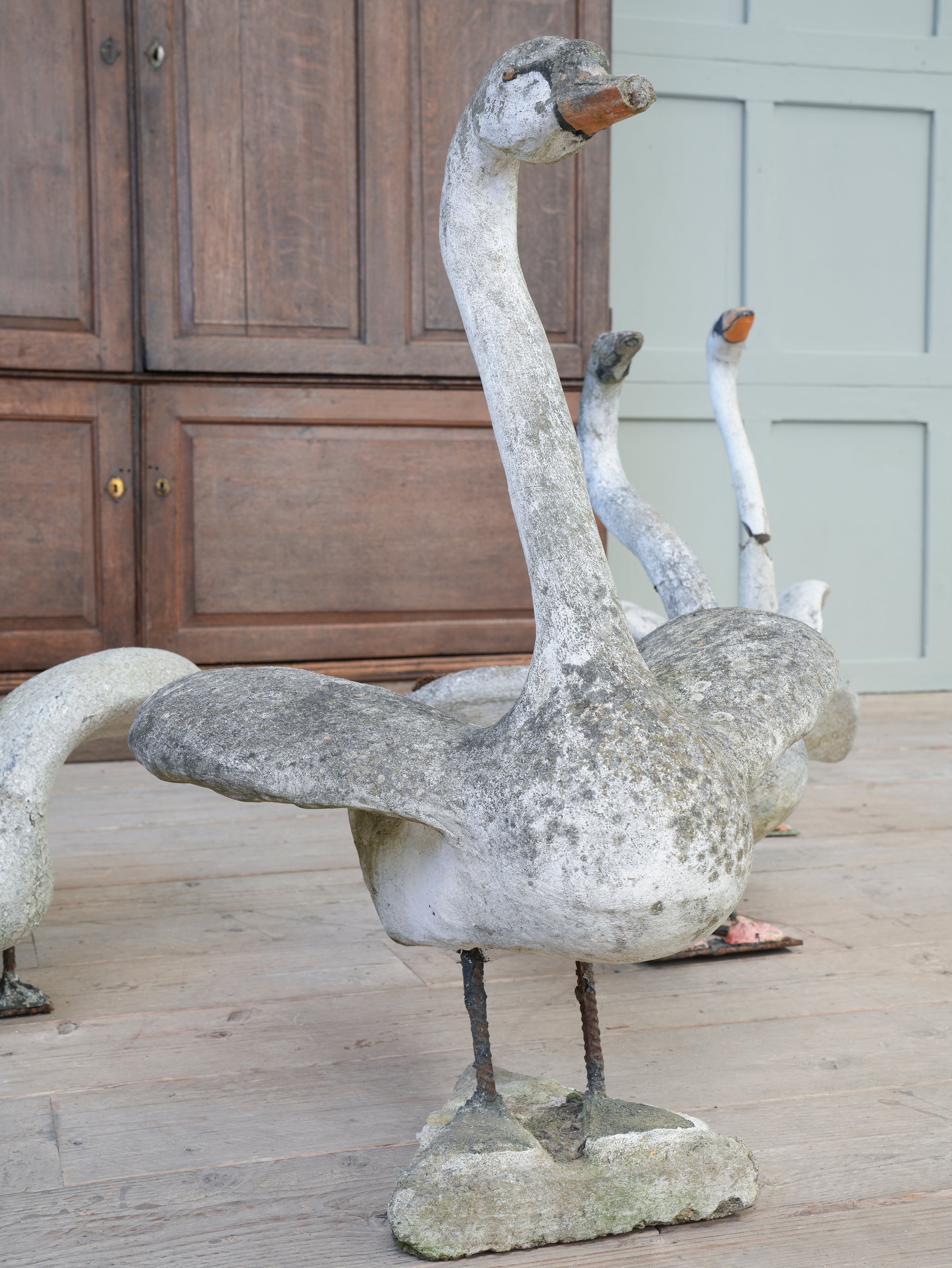 A Bevy of Composition Stone Swans