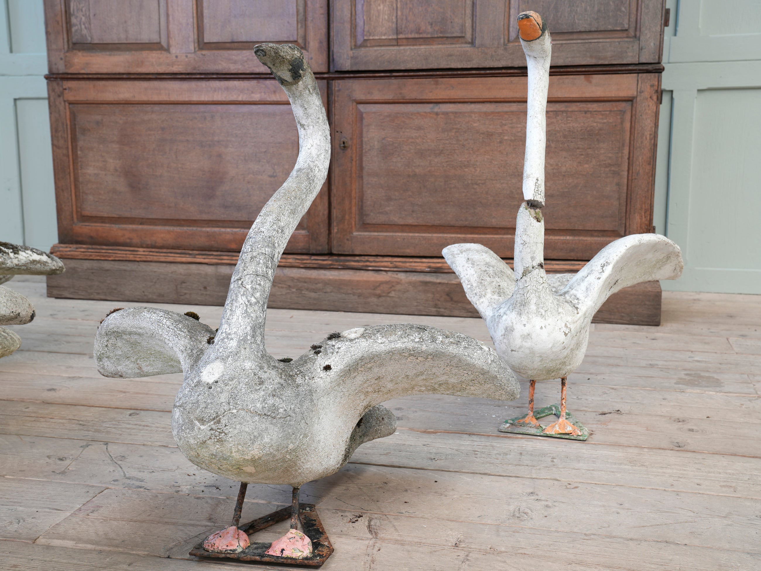 A Bevy of Composition Stone Swans