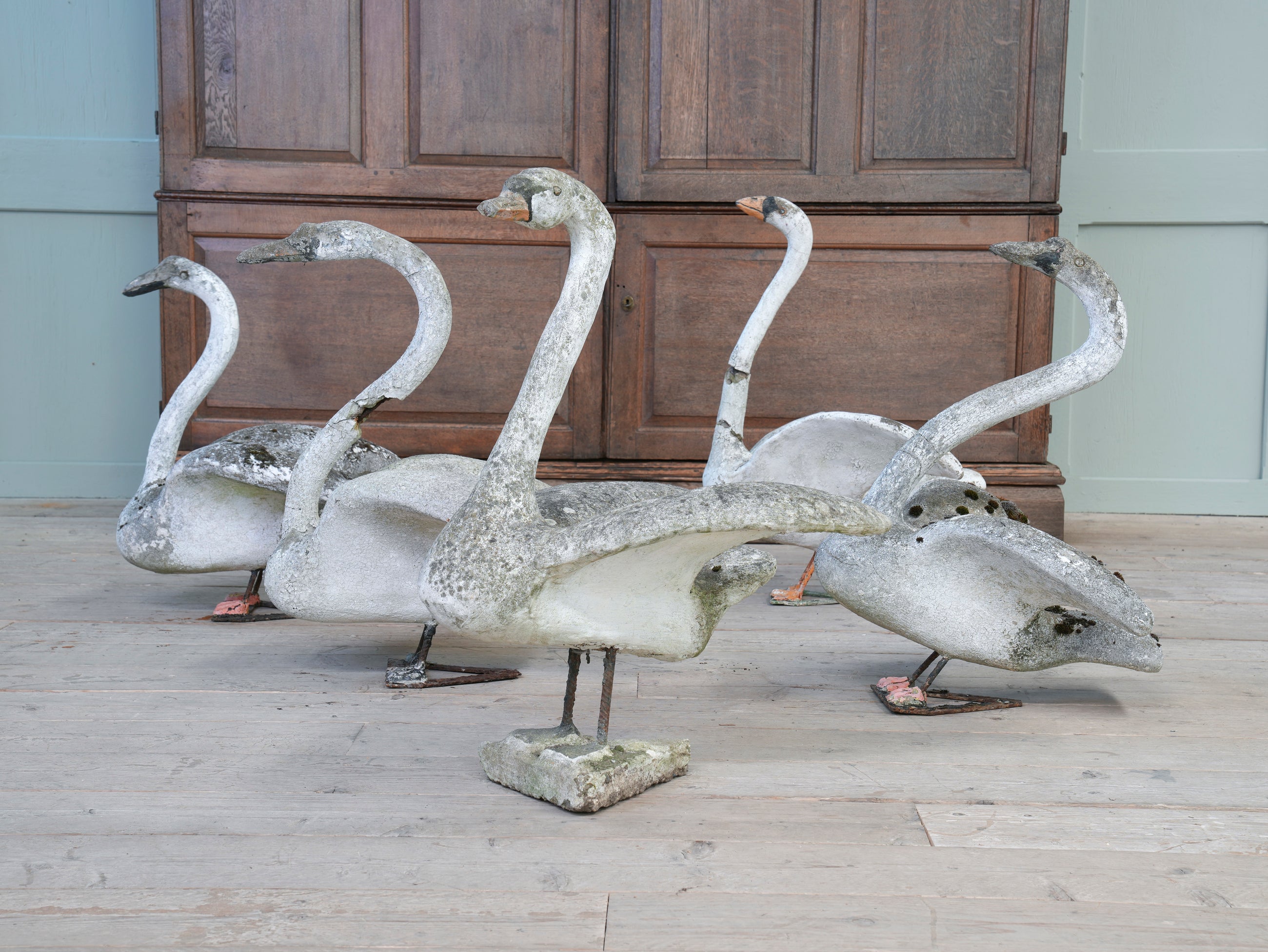 A Bevy of Composition Stone Swans