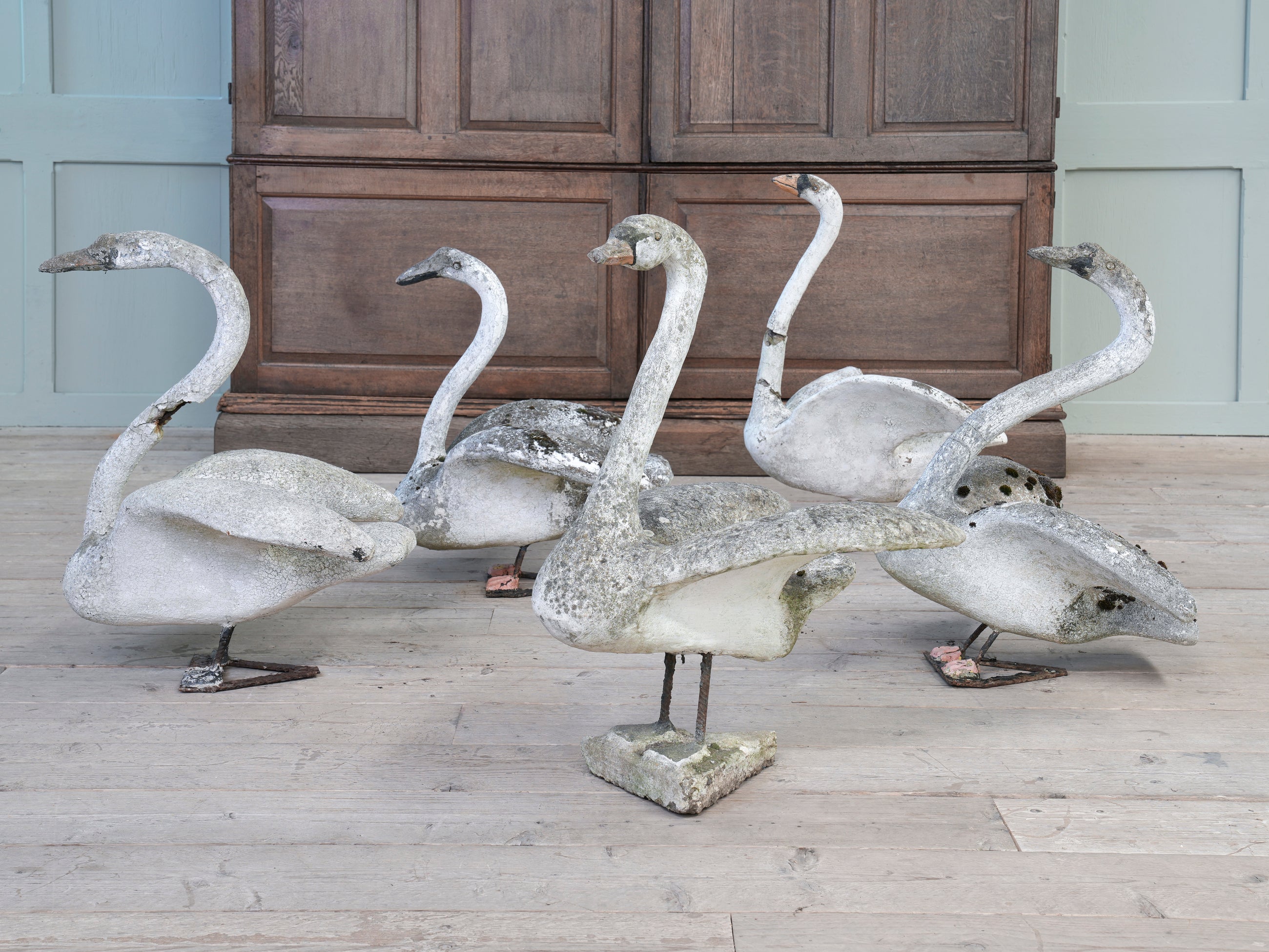A Bevy of Composition Stone Swans