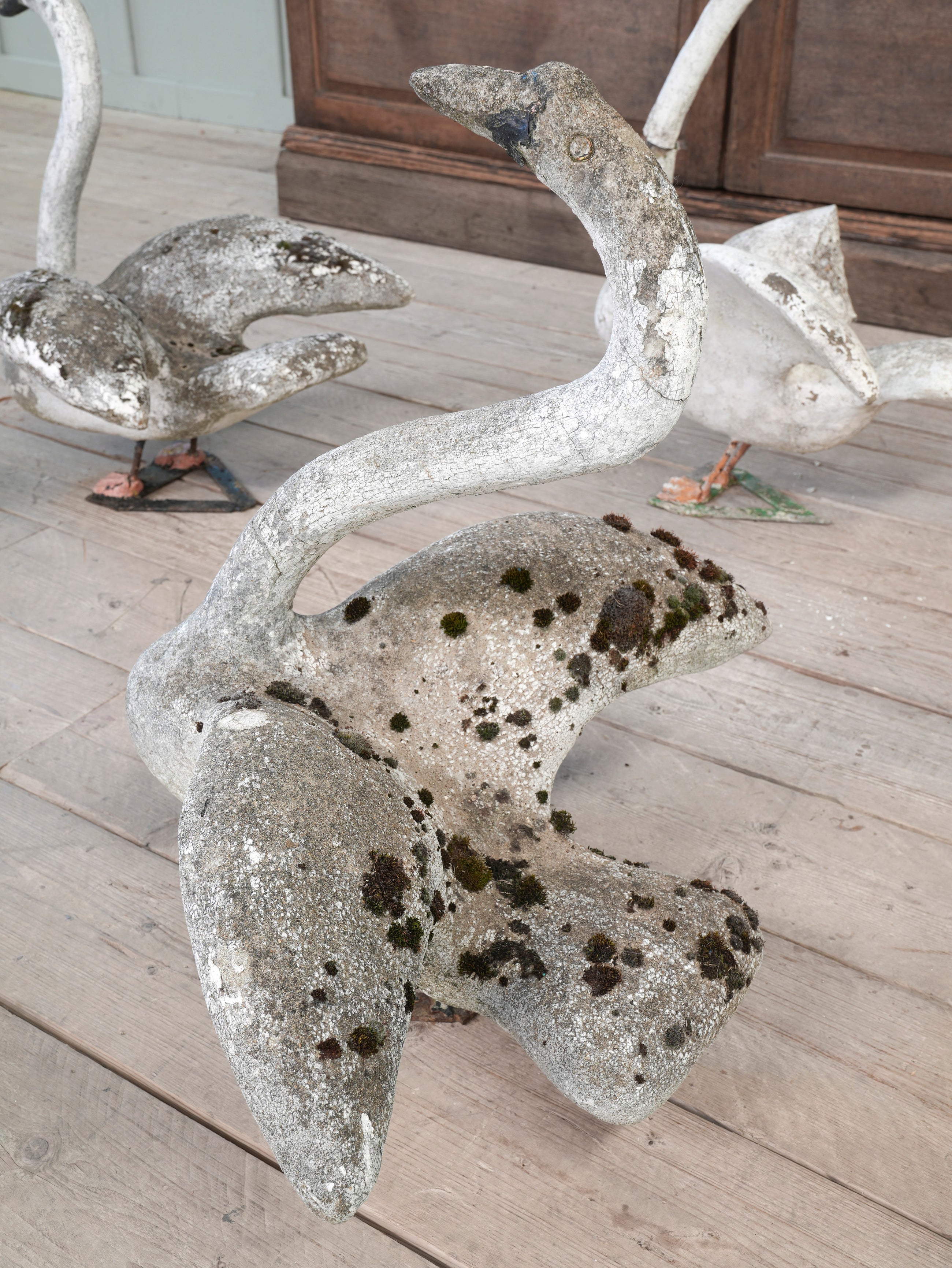 A Bevy of Composition Stone Swans