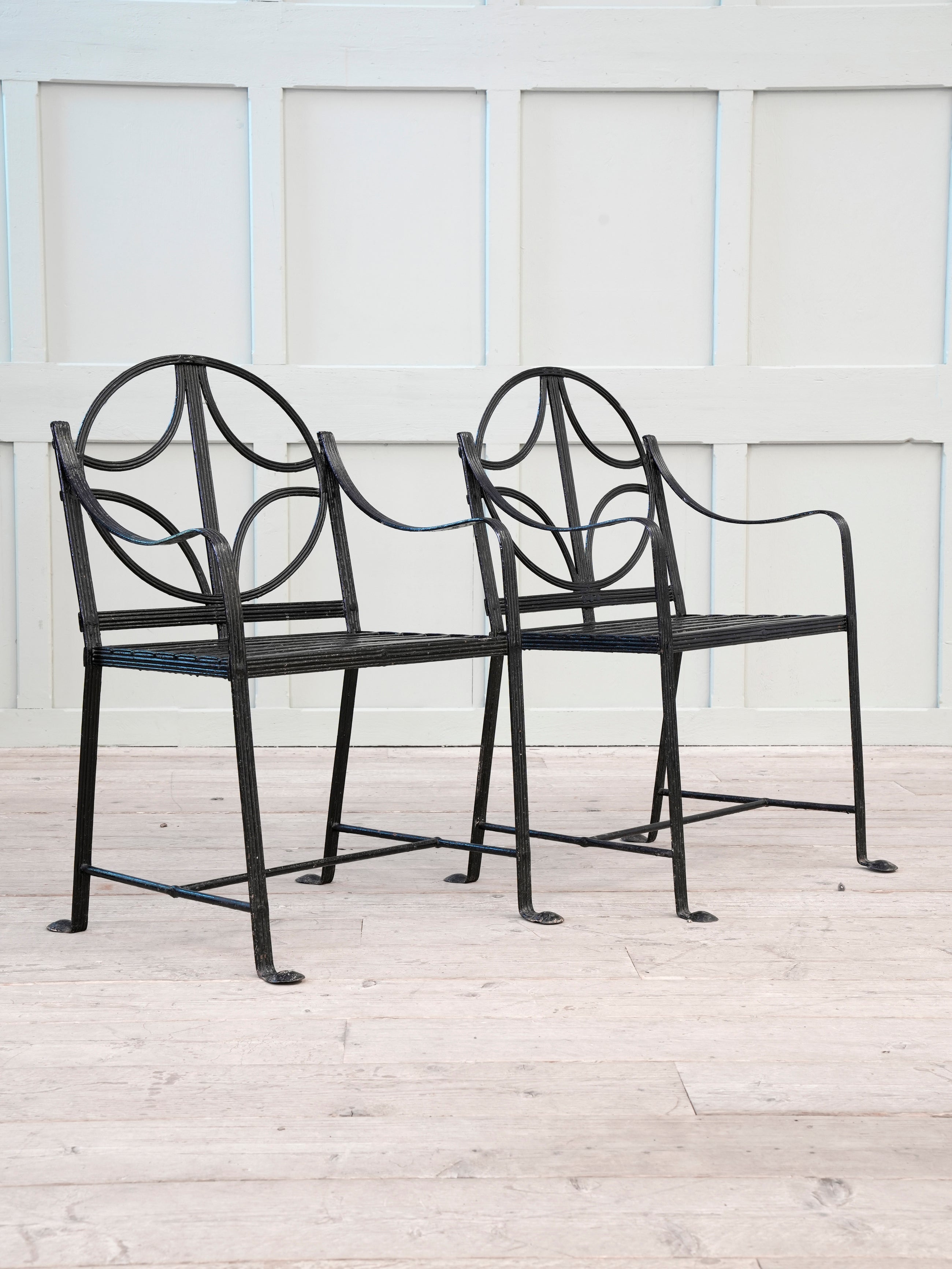 A Pair of Regency Wrought Iron Garden Chairs