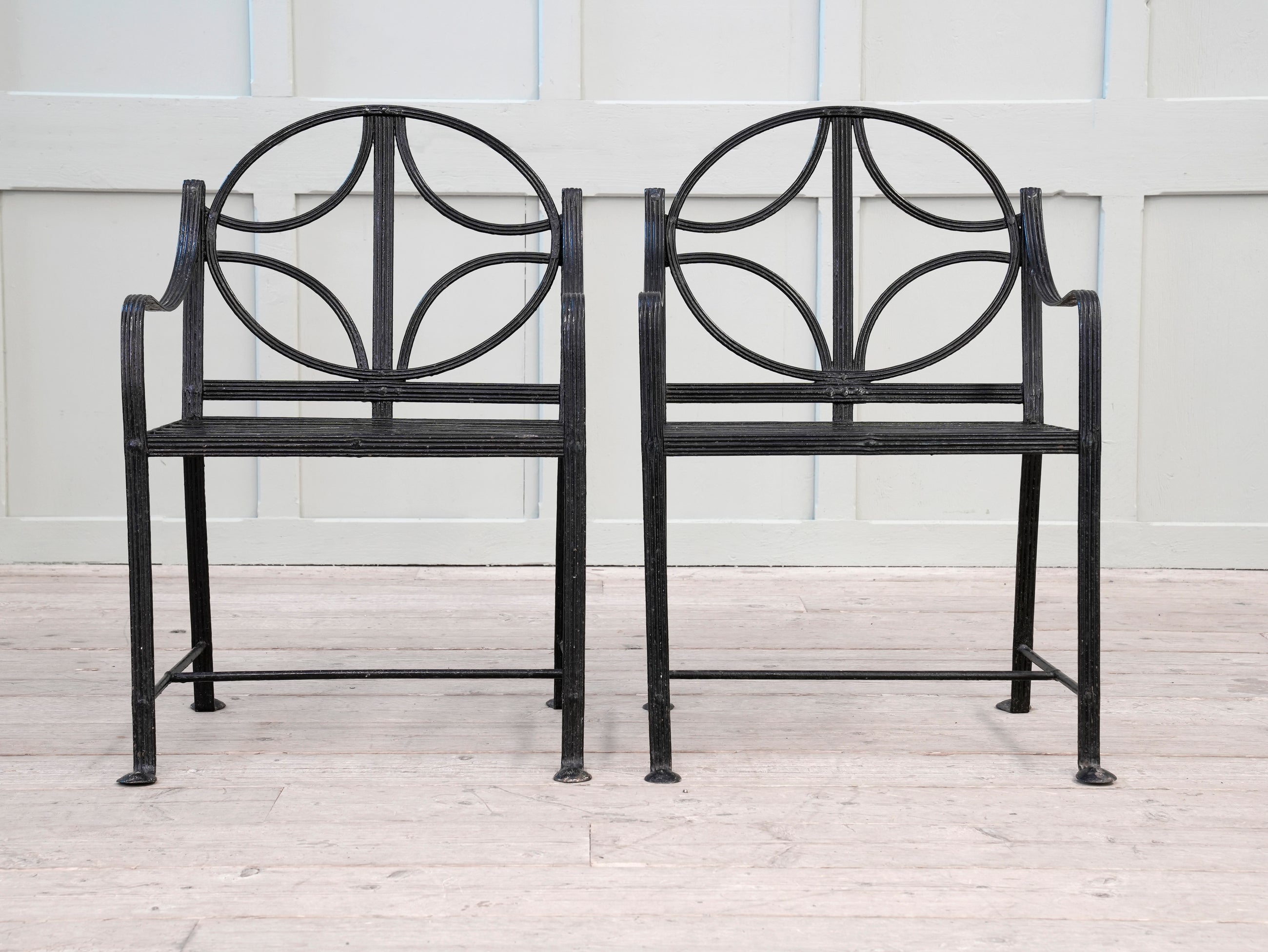A Pair of Regency Wrought Iron Garden Chairs