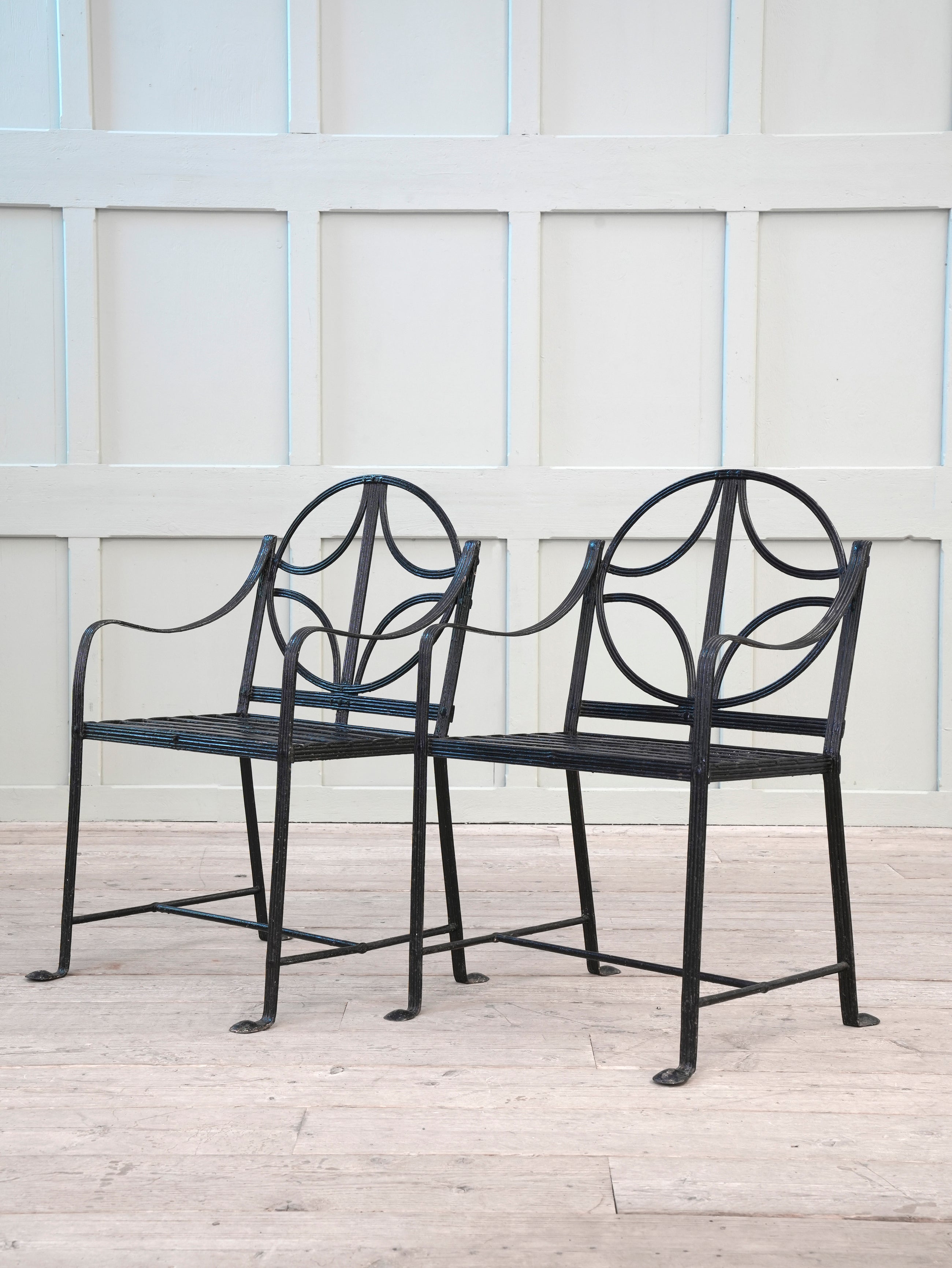 A Pair of Regency Wrought Iron Garden Chairs