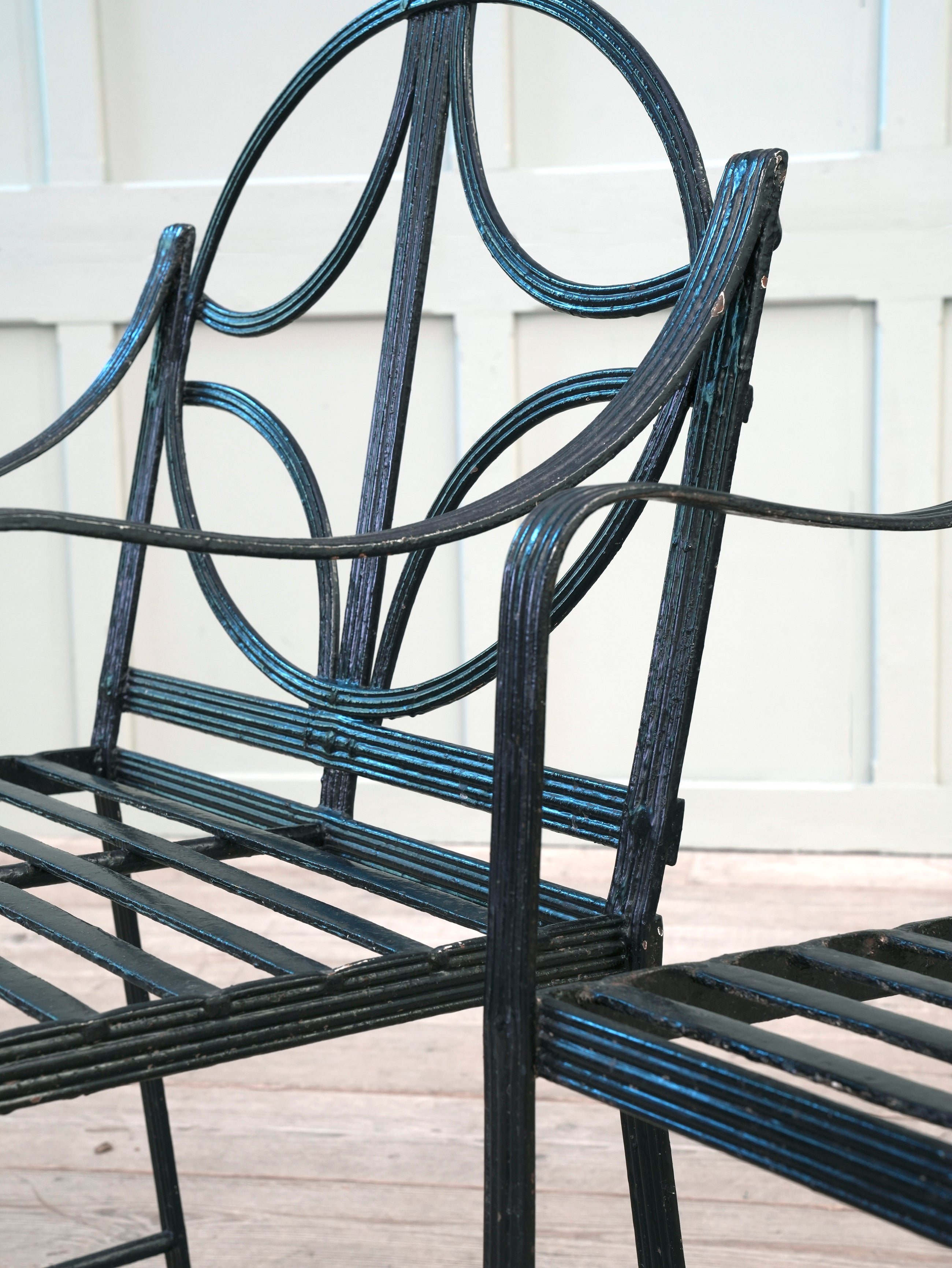 A Pair of Regency Wrought Iron Garden Chairs
