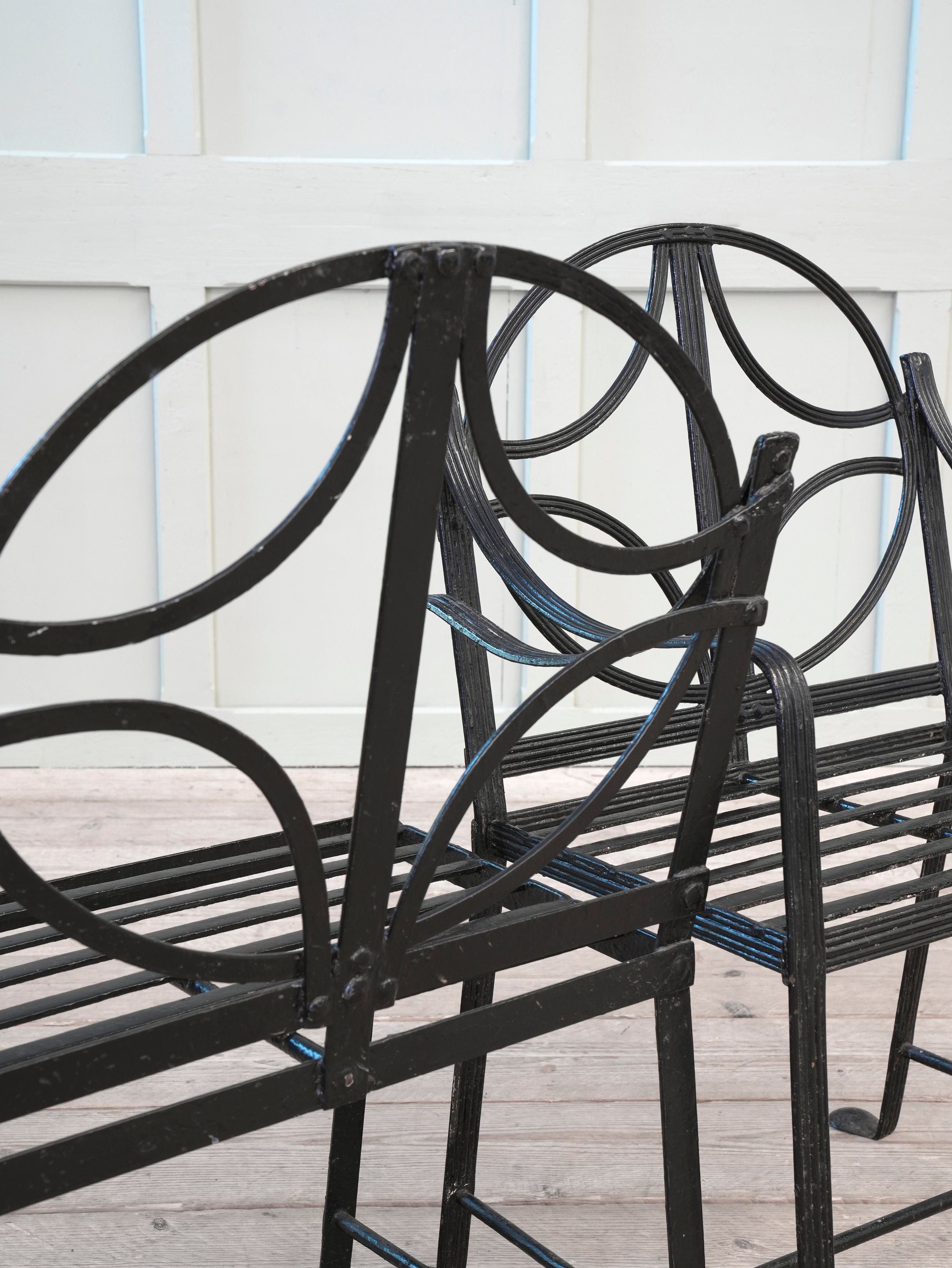 A Pair of Regency Wrought Iron Garden Chairs