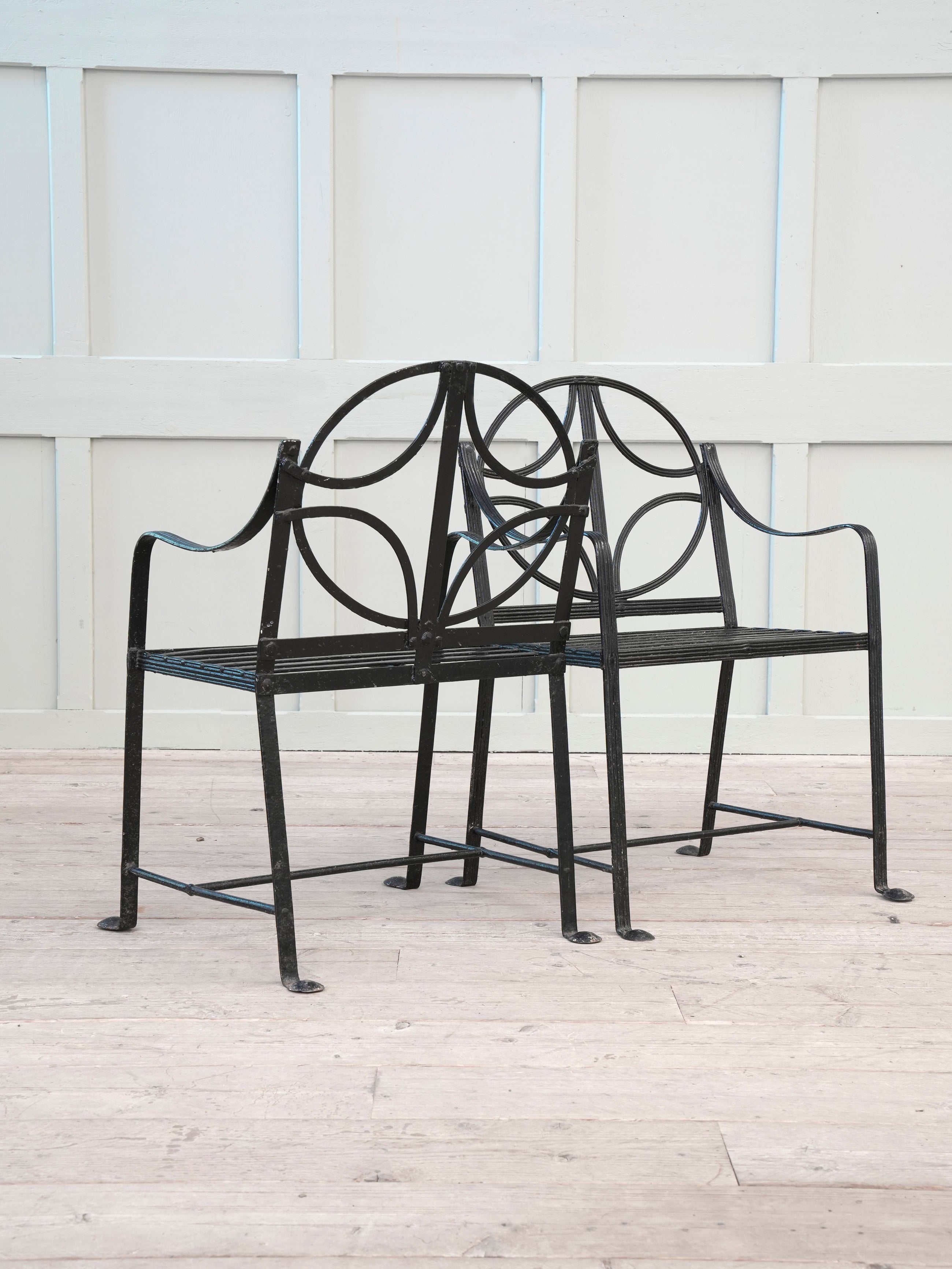 A Pair of Regency Wrought Iron Garden Chairs