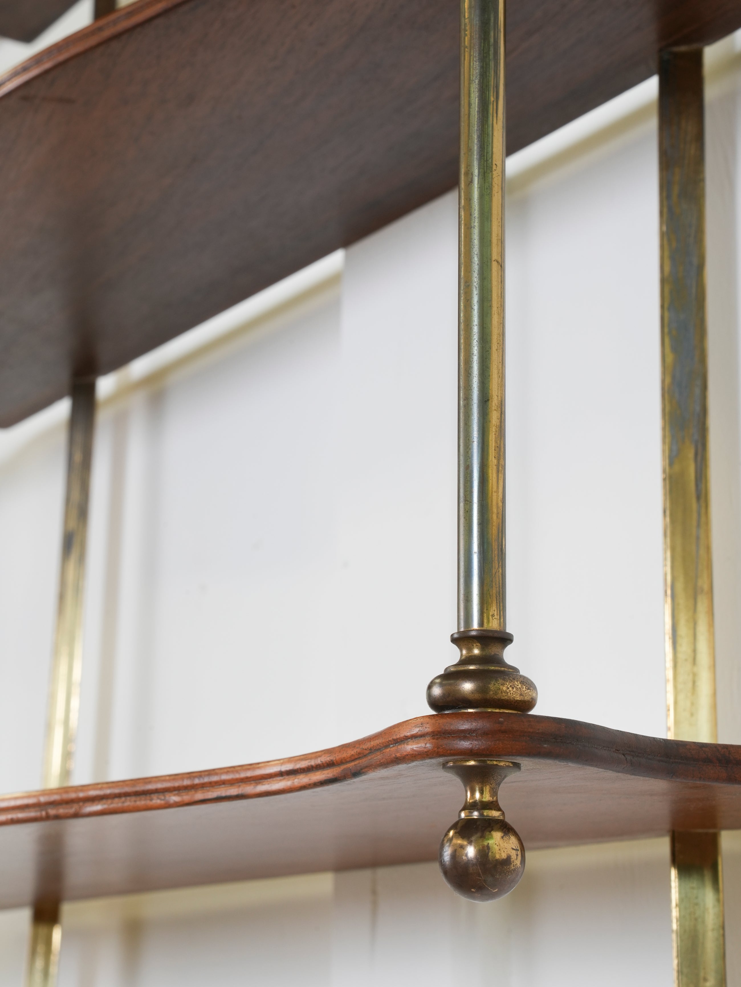 A Pair of Mahogany & Brass Hanging Shelves
