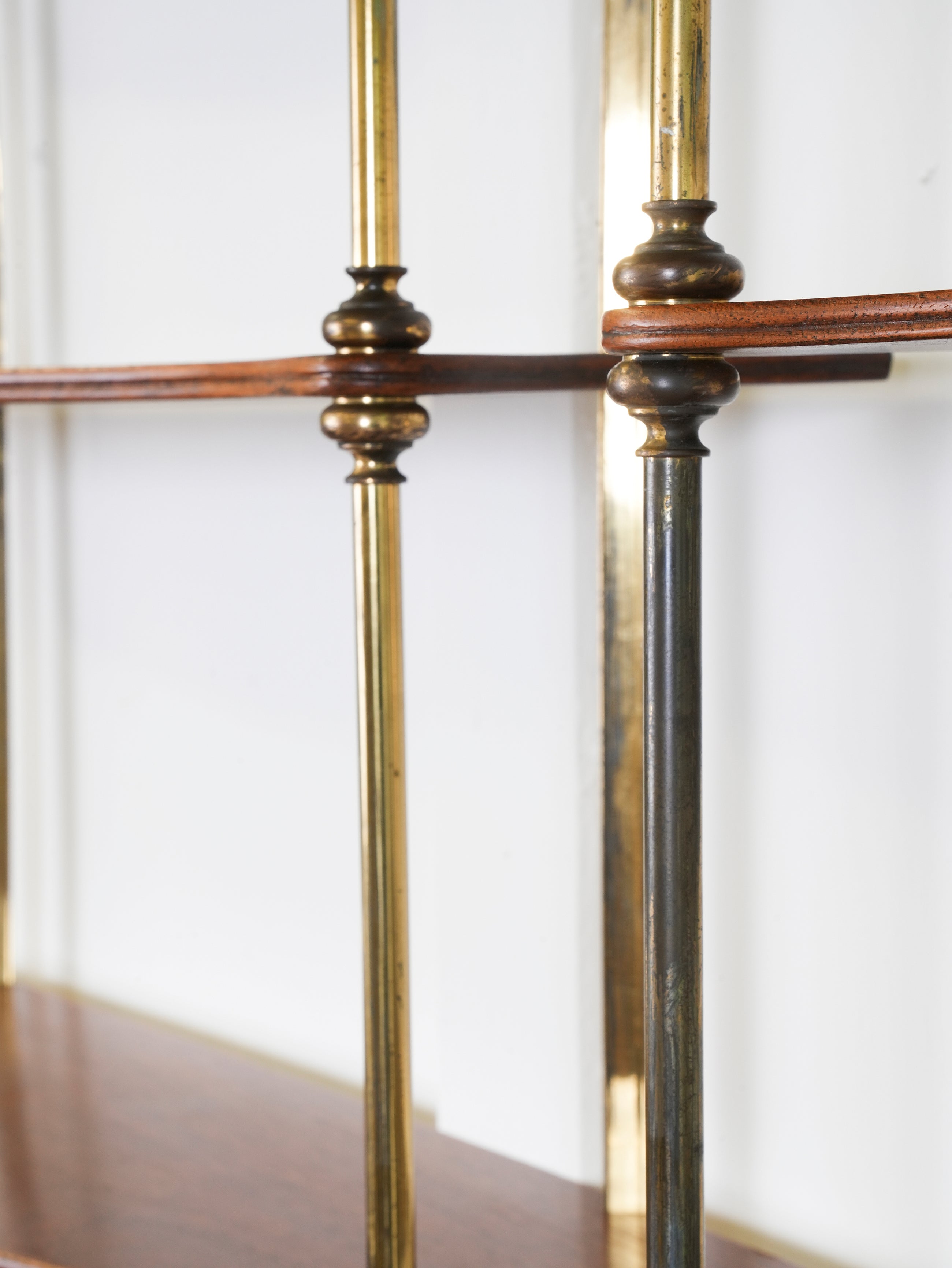 A Pair of Mahogany & Brass Hanging Shelves