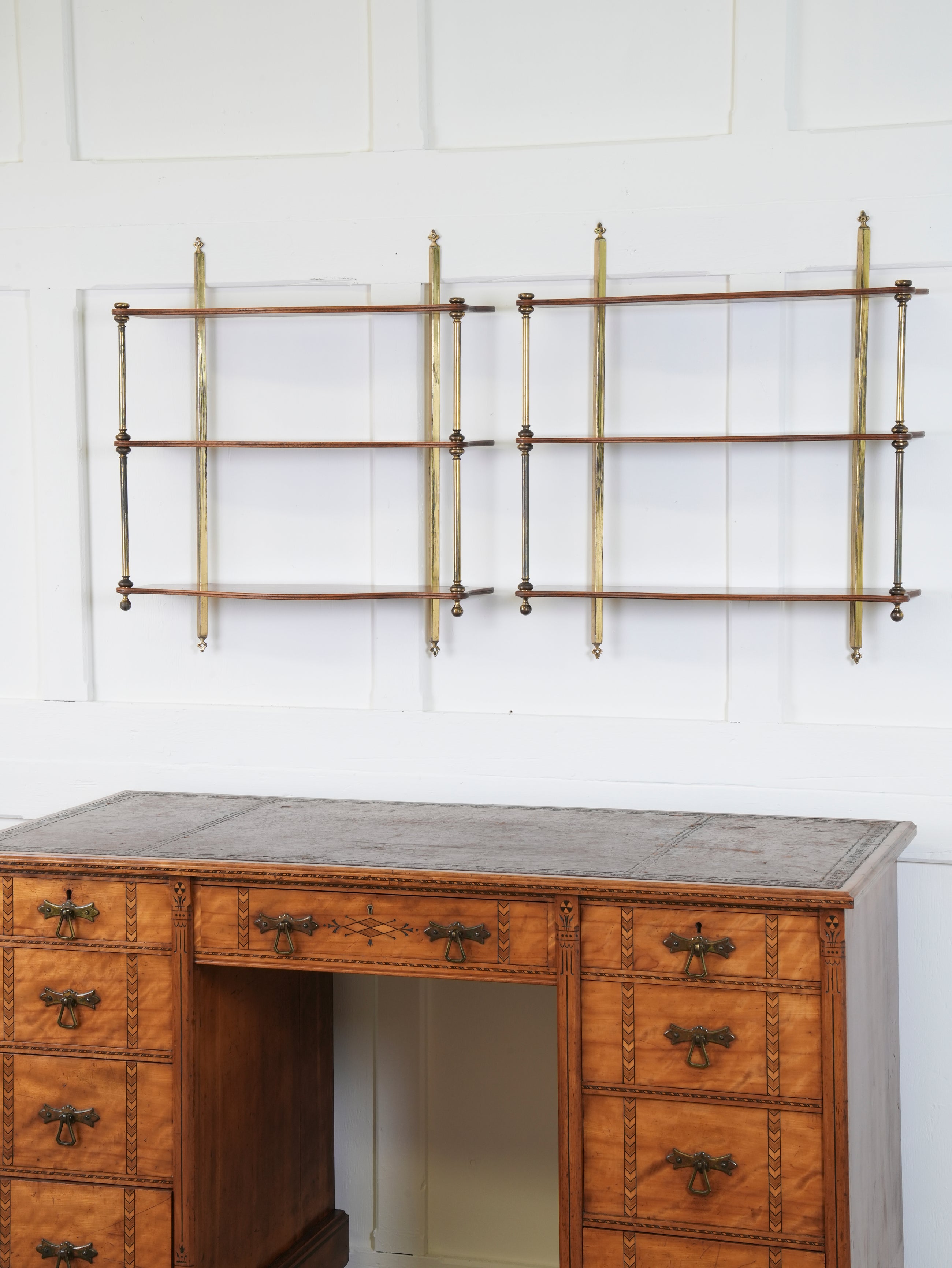 A Pair of Mahogany & Brass Hanging Shelves