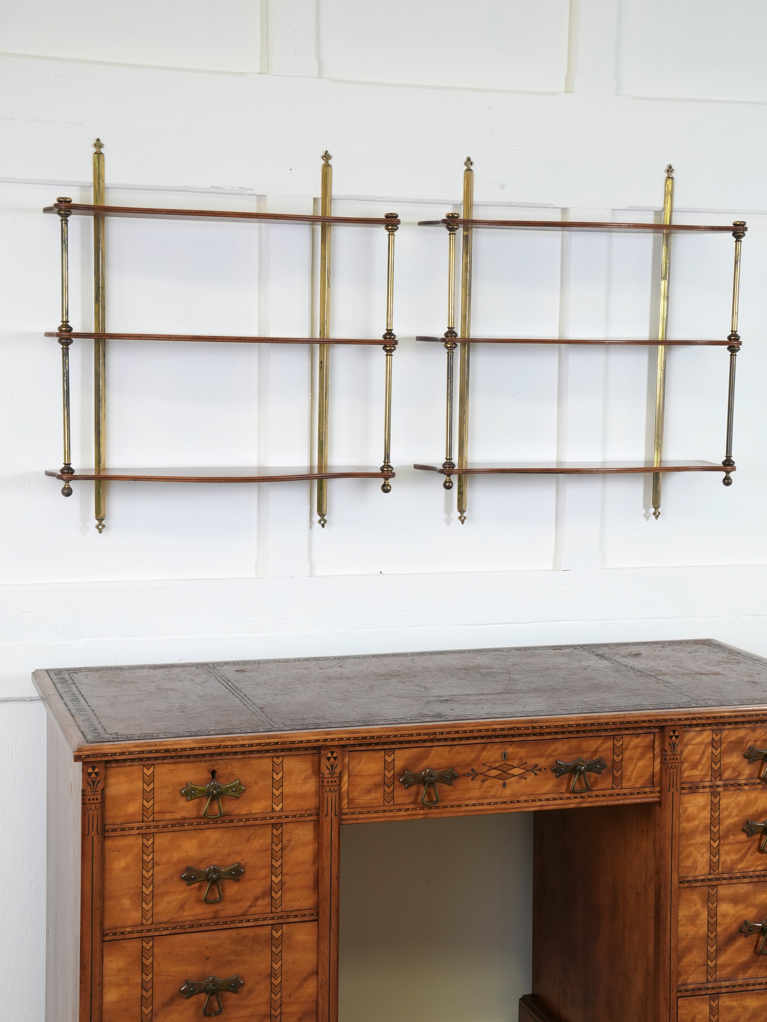 A Pair of Mahogany & Brass Hanging Shelves