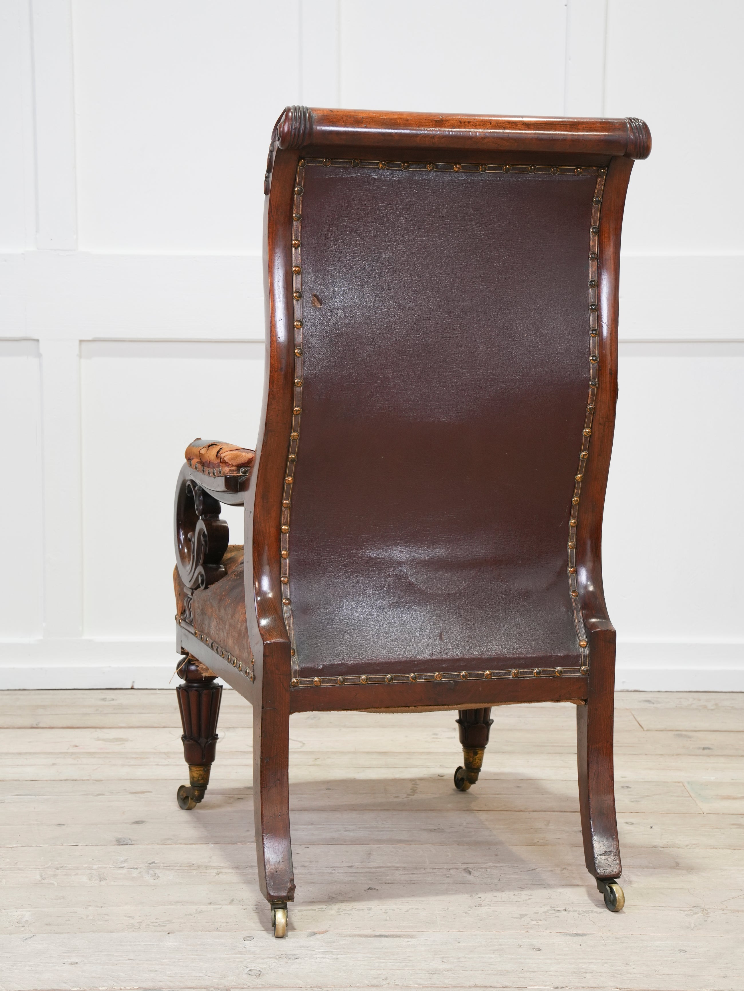 A 19th Century Neo- Classical Mahogany Library Chair