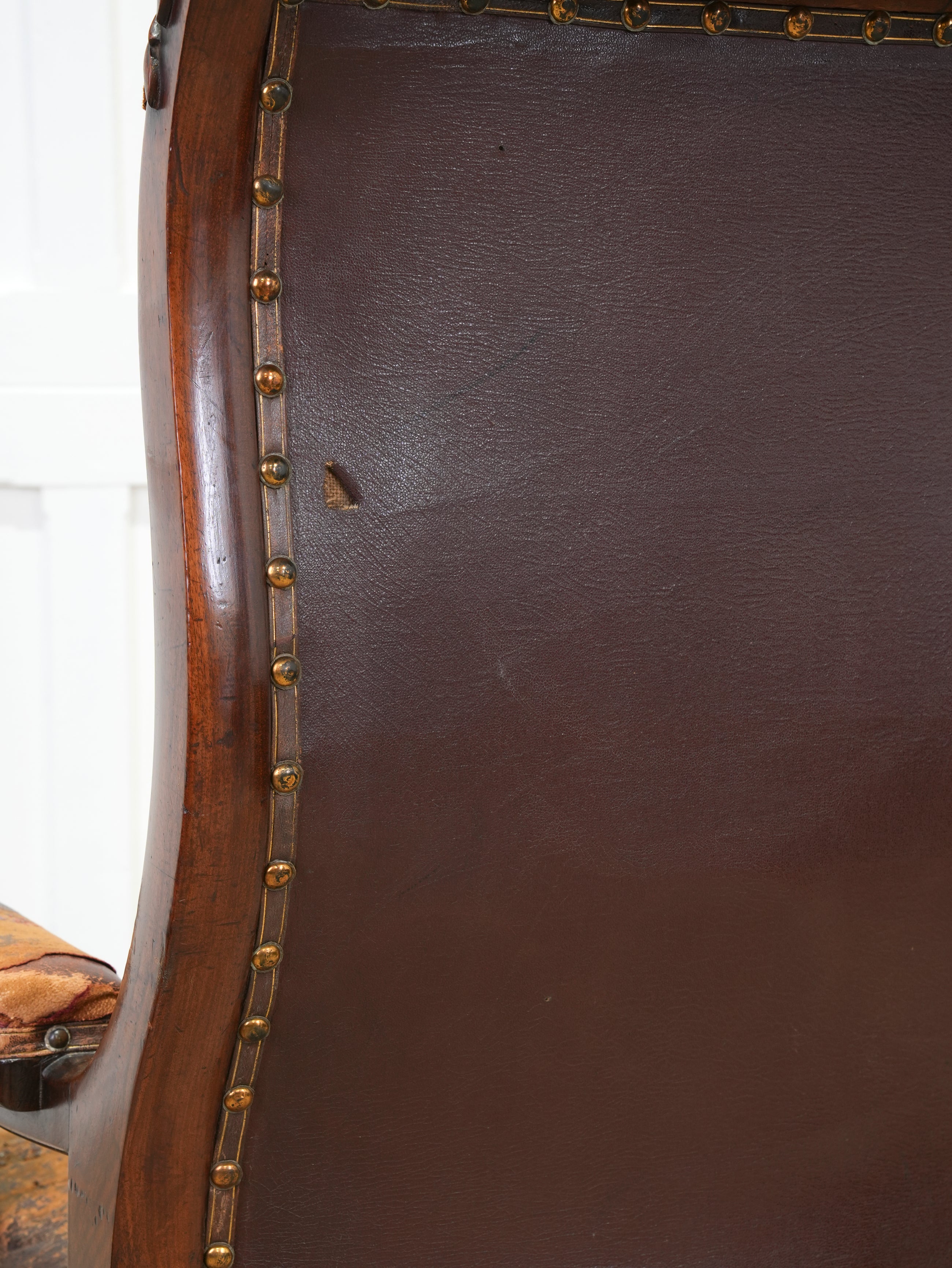 A 19th Century Neo- Classical Mahogany Library Chair