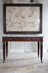 A George IV Mahogany Writing Desk with a Fossil Marble Top