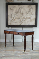 A George IV Mahogany Writing Desk with a Fossil Marble Top