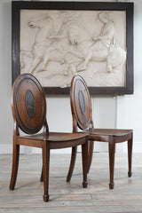 A Pair of George III Side Chairs in the manner of Mayhew & Ince
