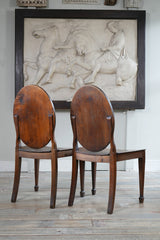 A Pair of George III Side Chairs in the manner of Mayhew & Ince