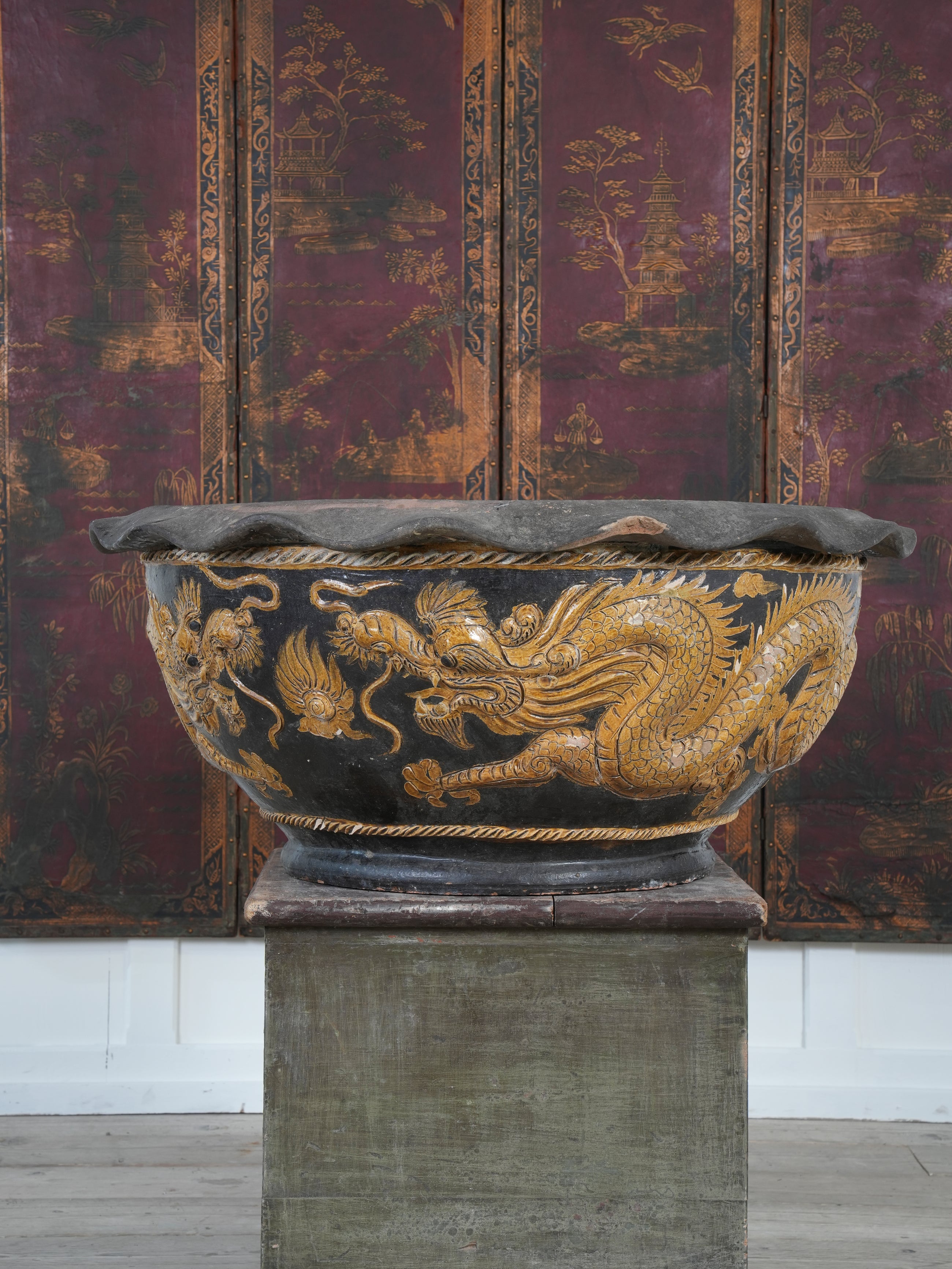 A Large Glazed Terracotta Dragon Bowl
