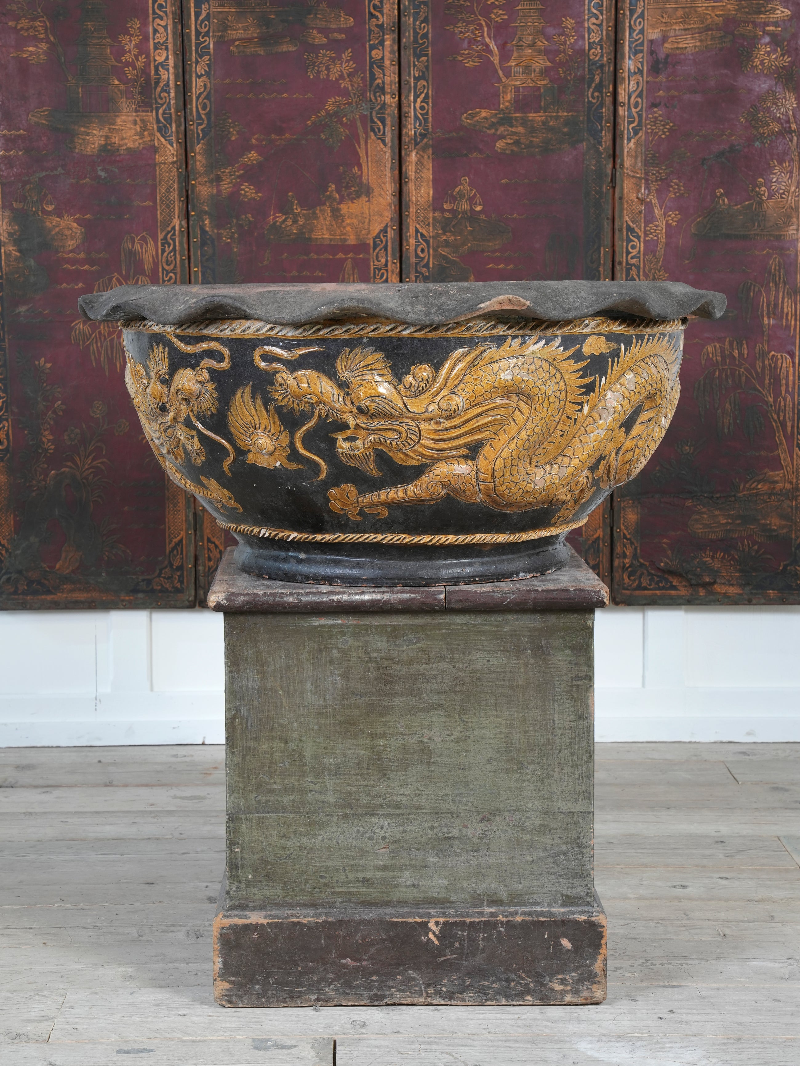 A Large Glazed Terracotta Dragon Bowl