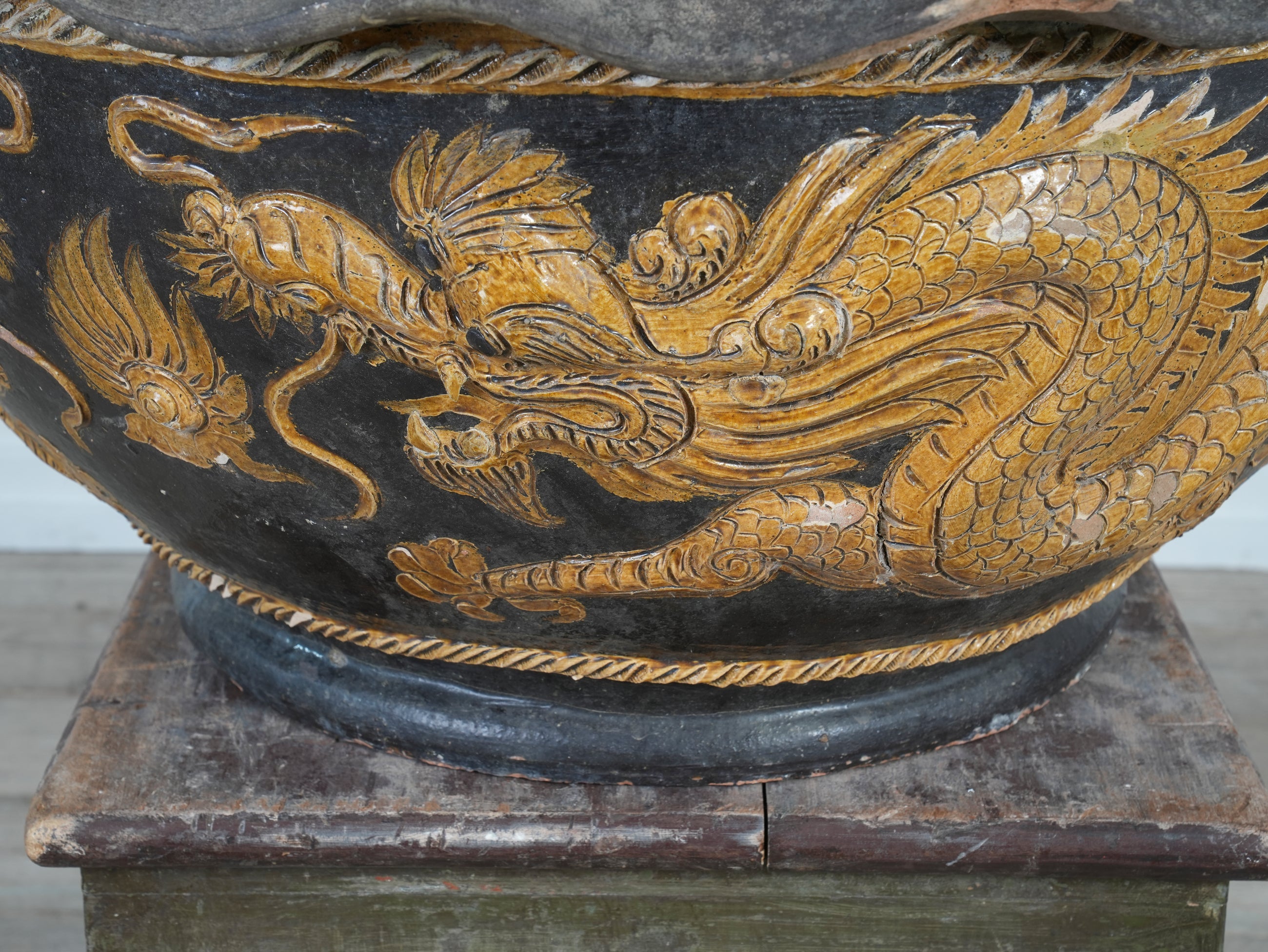 A Large Glazed Terracotta Dragon Bowl