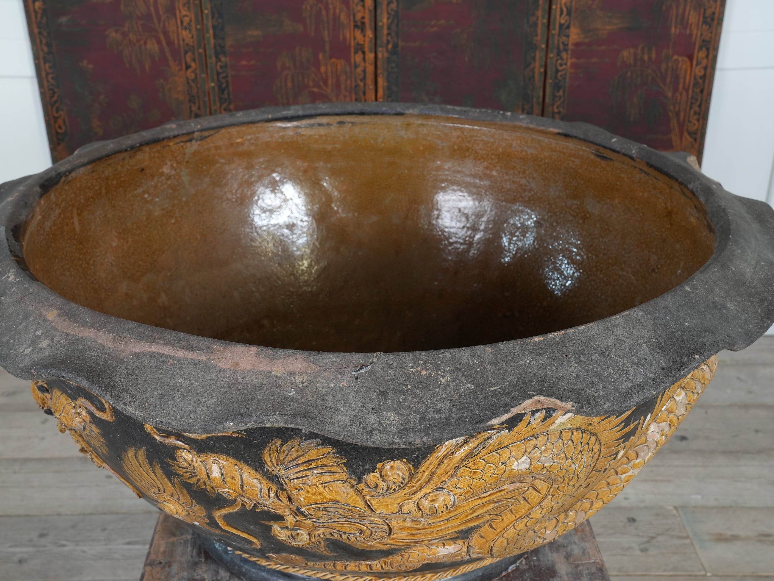 A Large Glazed Terracotta Dragon Bowl