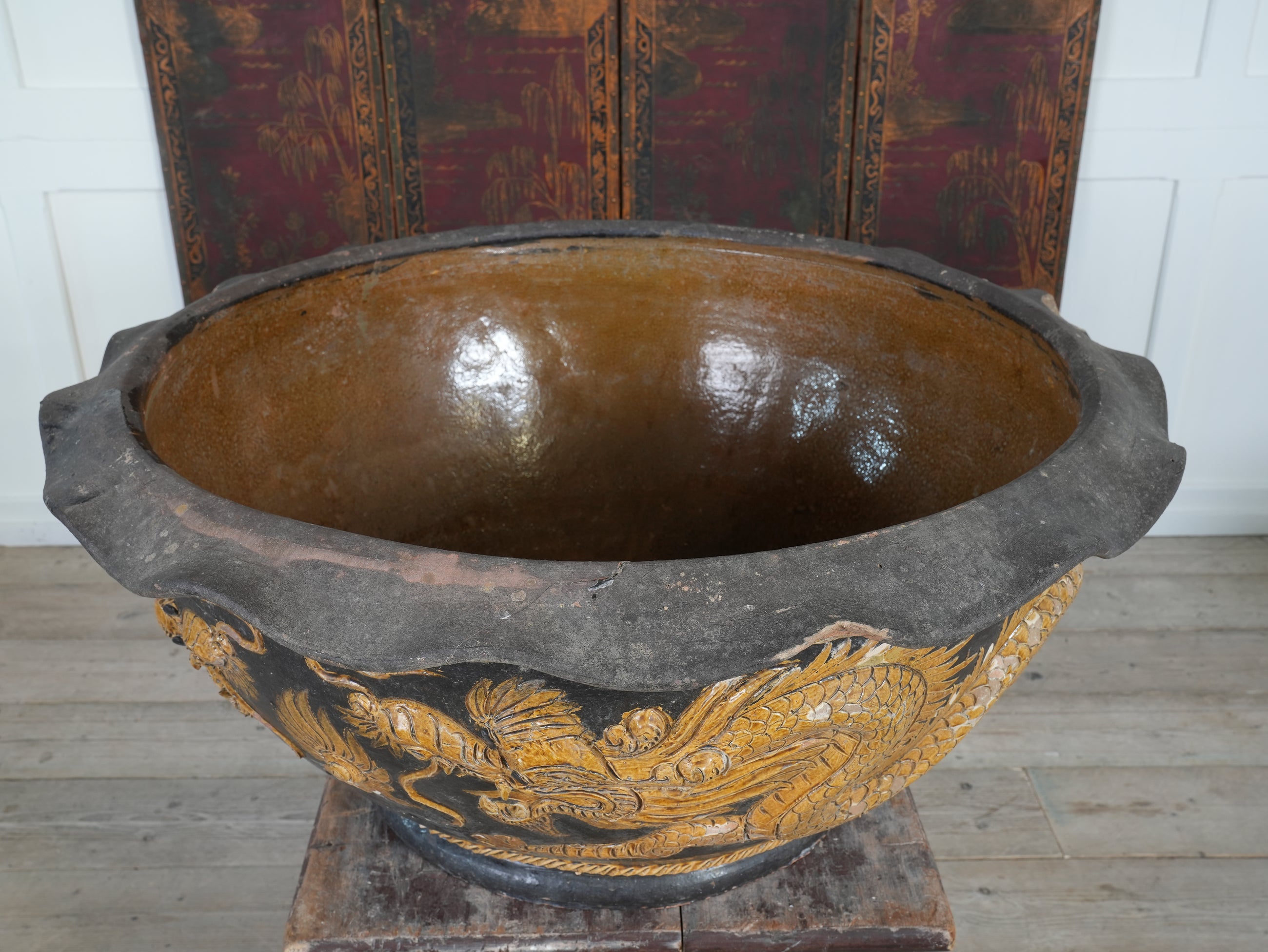 A Large Glazed Terracotta Dragon Bowl