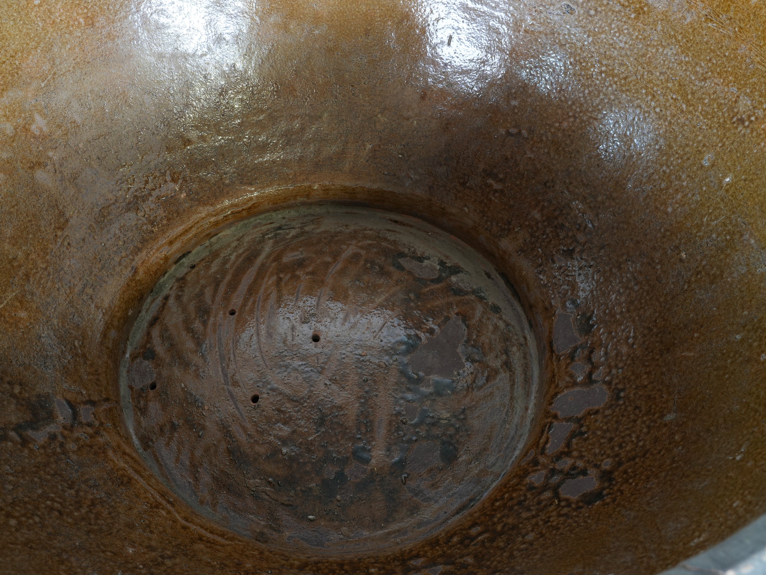 A Large Glazed Terracotta Dragon Bowl