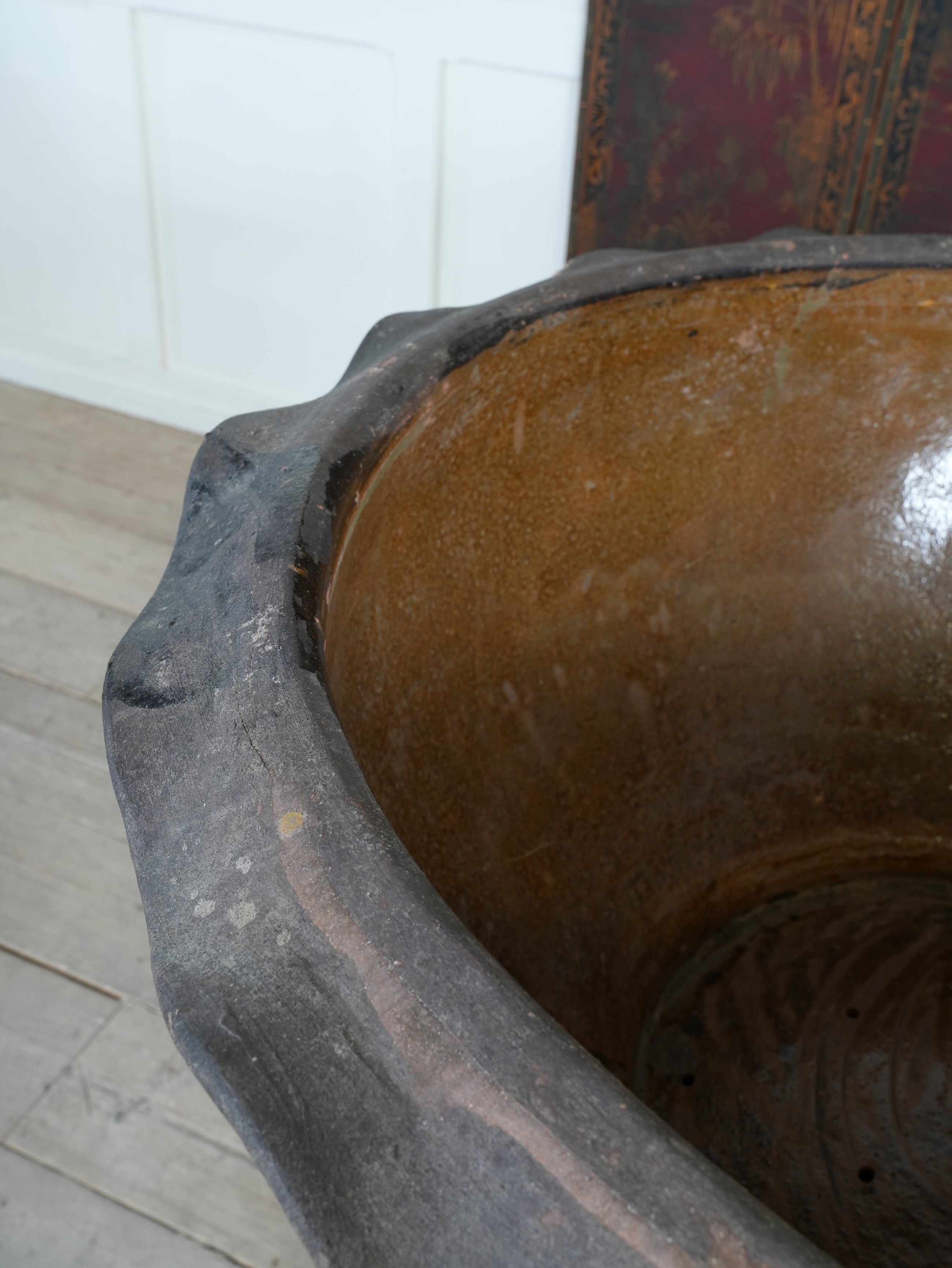 A Large Glazed Terracotta Dragon Bowl