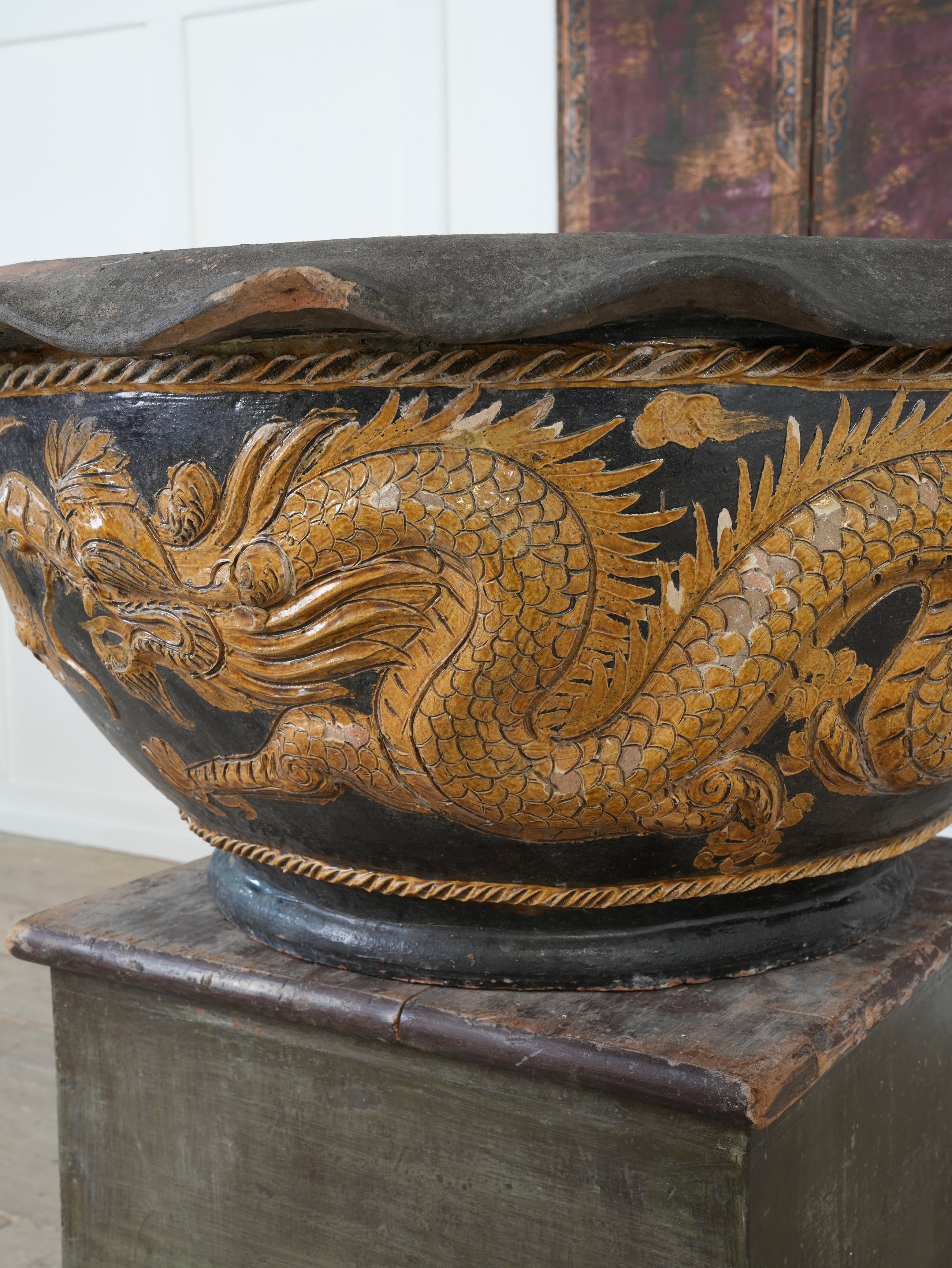 A Large Glazed Terracotta Dragon Bowl