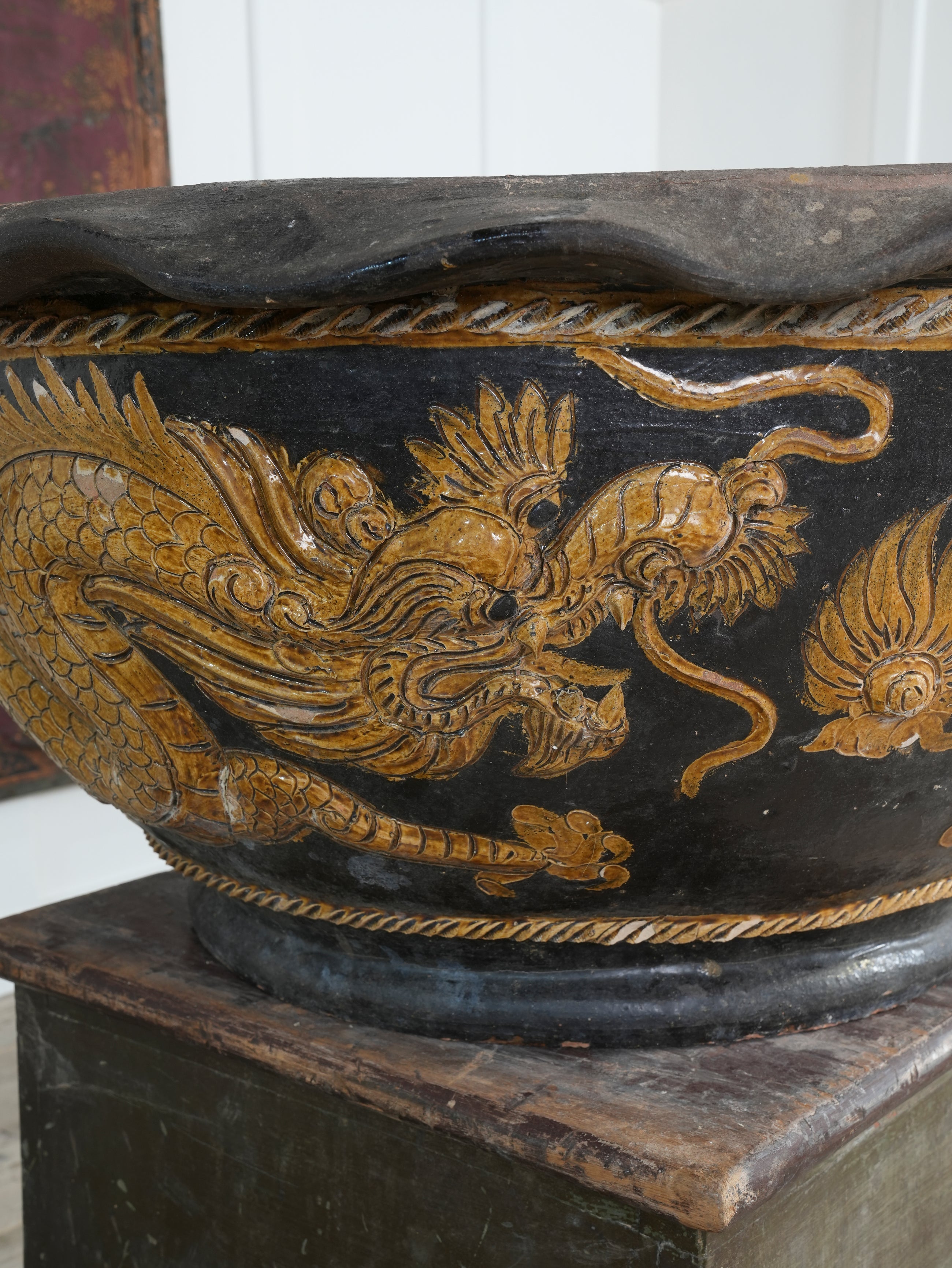 A Large Glazed Terracotta Dragon Bowl