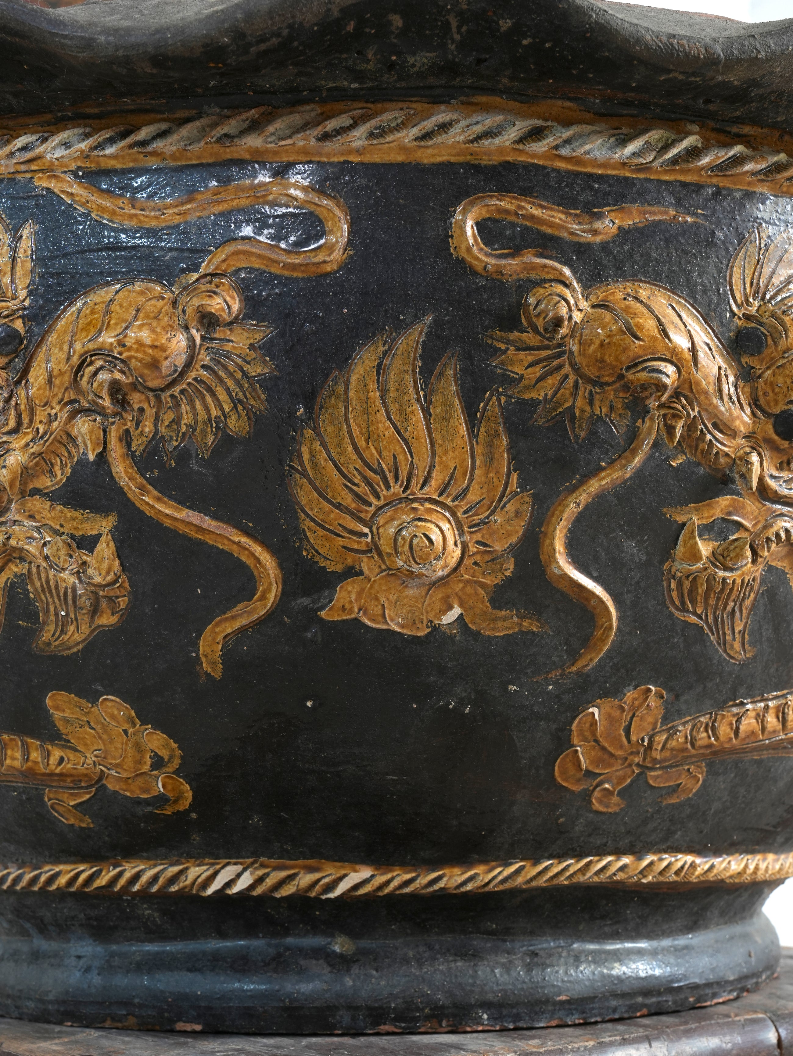 A Large Glazed Terracotta Dragon Bowl