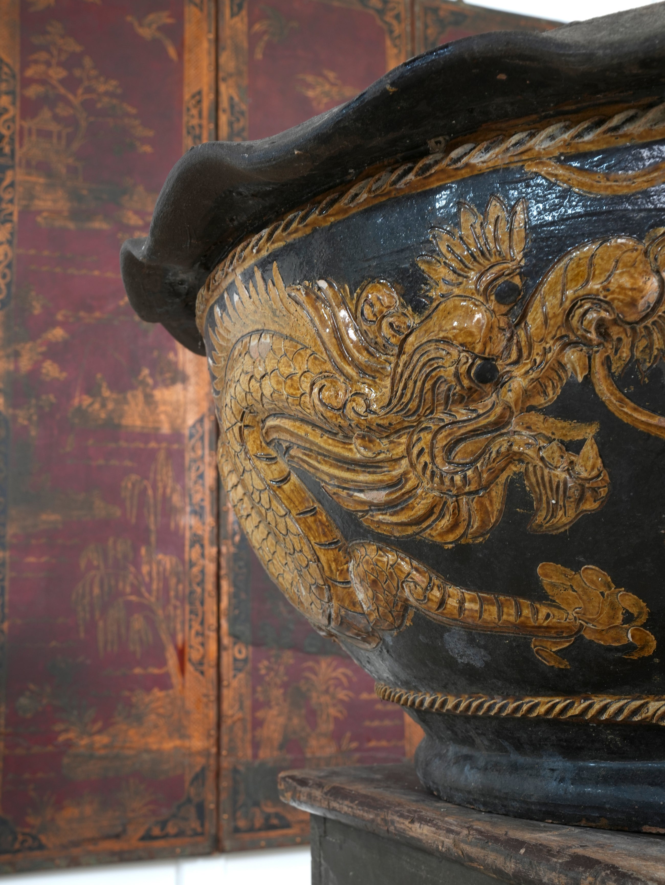 A Large Glazed Terracotta Dragon Bowl