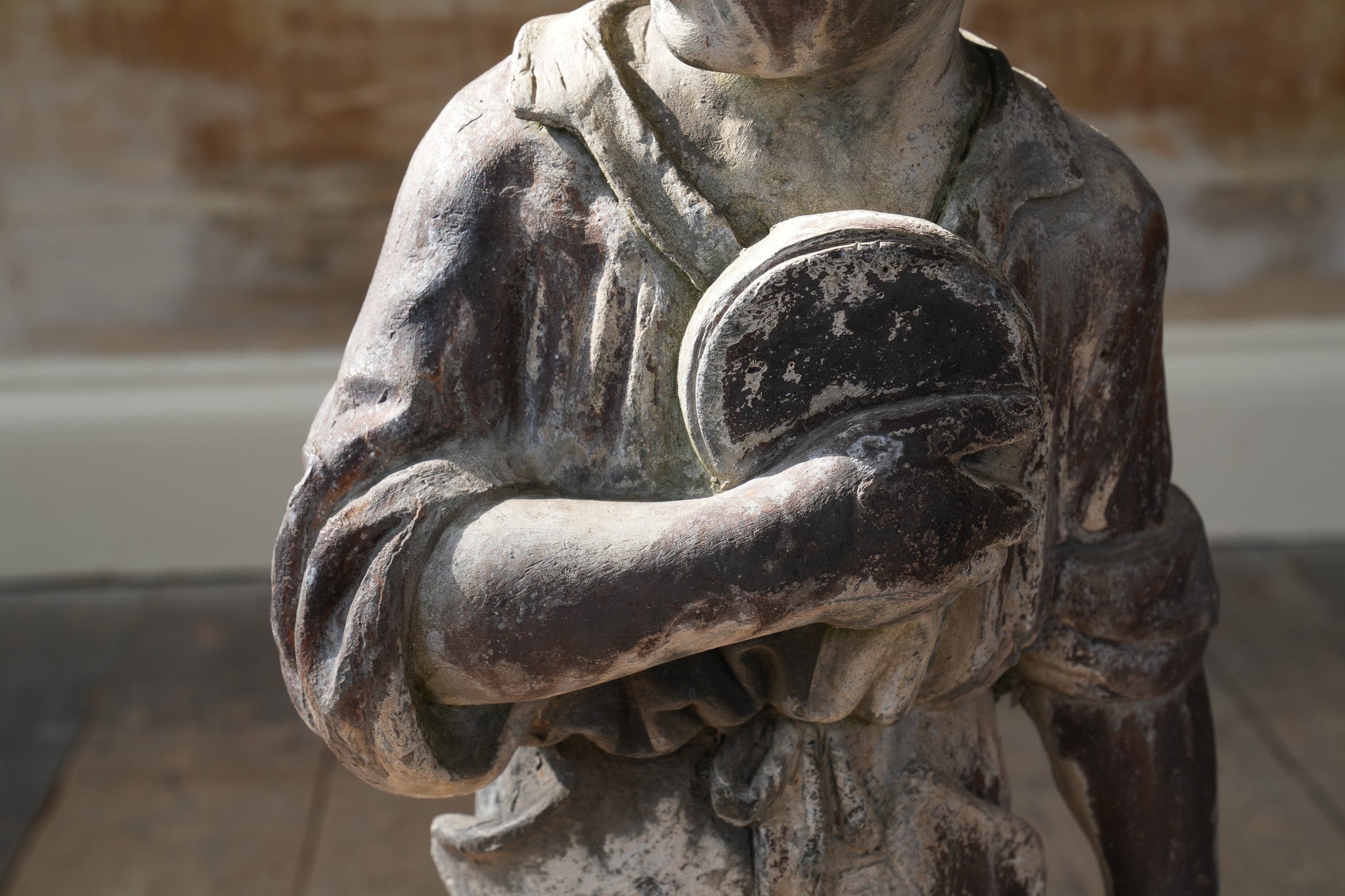 A Lead Statue of a Boy
