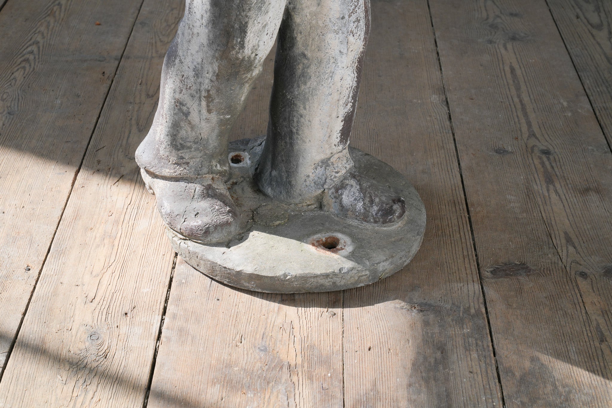 A Lead Statue of a Boy