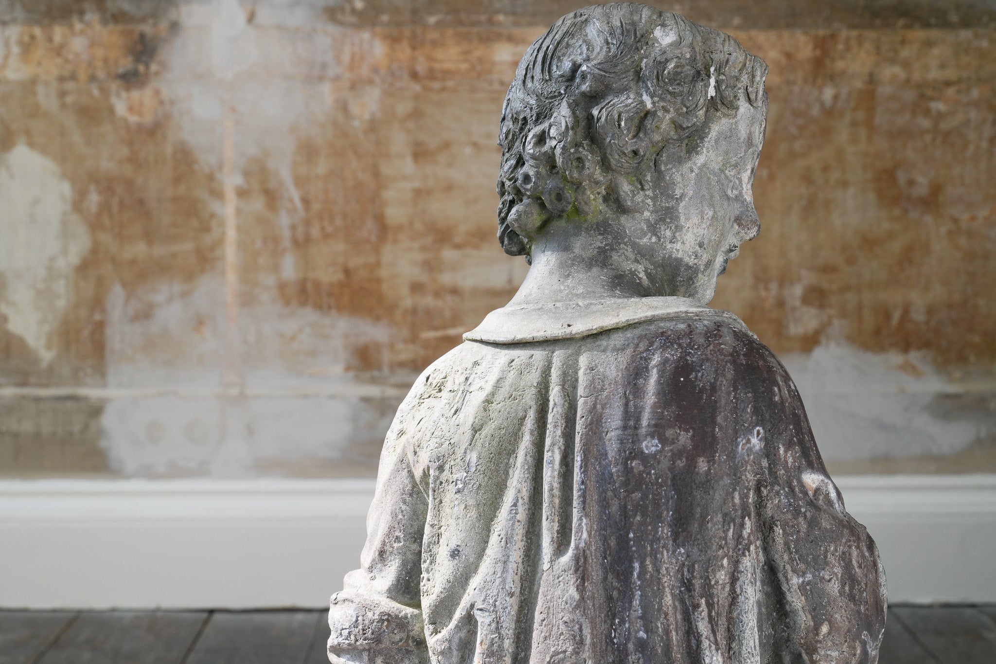 A Lead Statue of a Boy