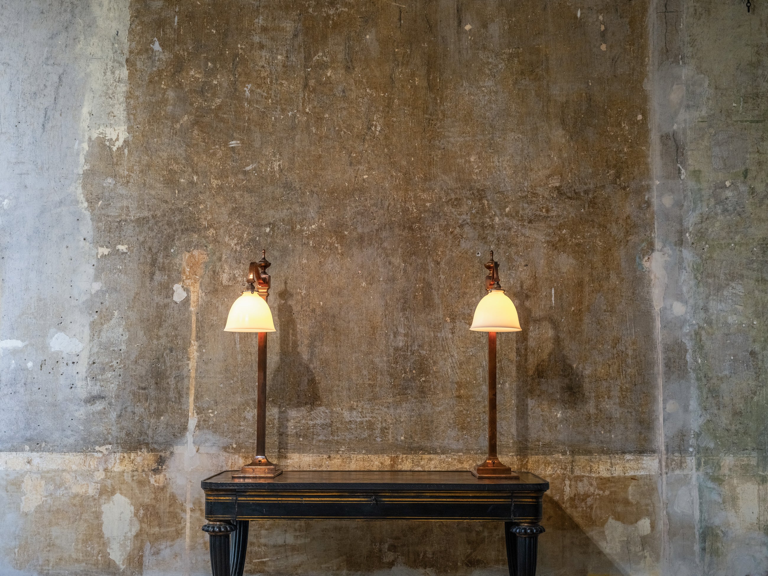 A Pair of Bronzed Counter Lamps