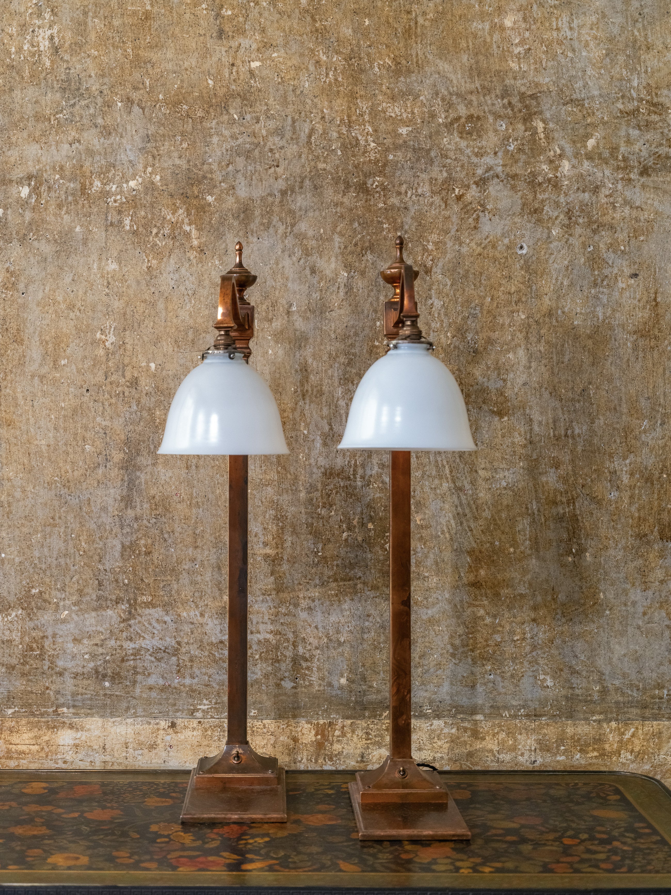 A Pair of Bronzed Counter Lamps
