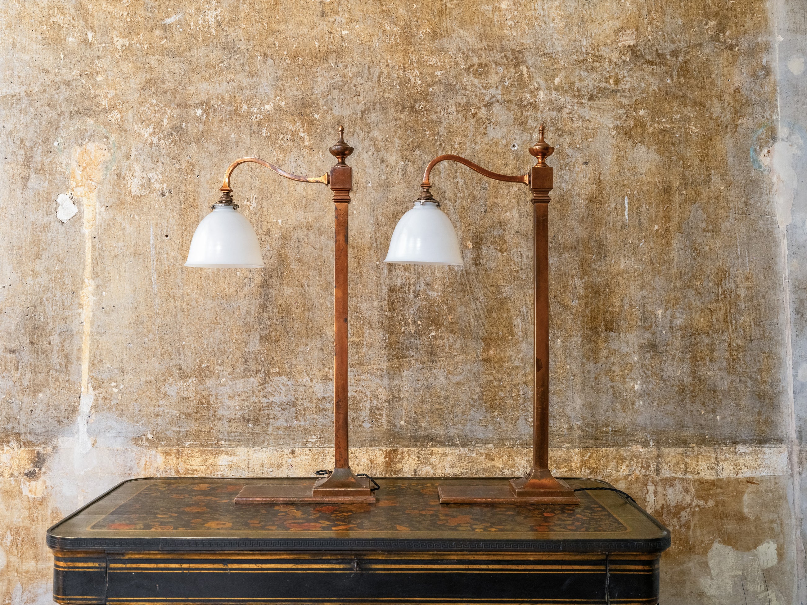 A Pair of Bronzed Counter Lamps