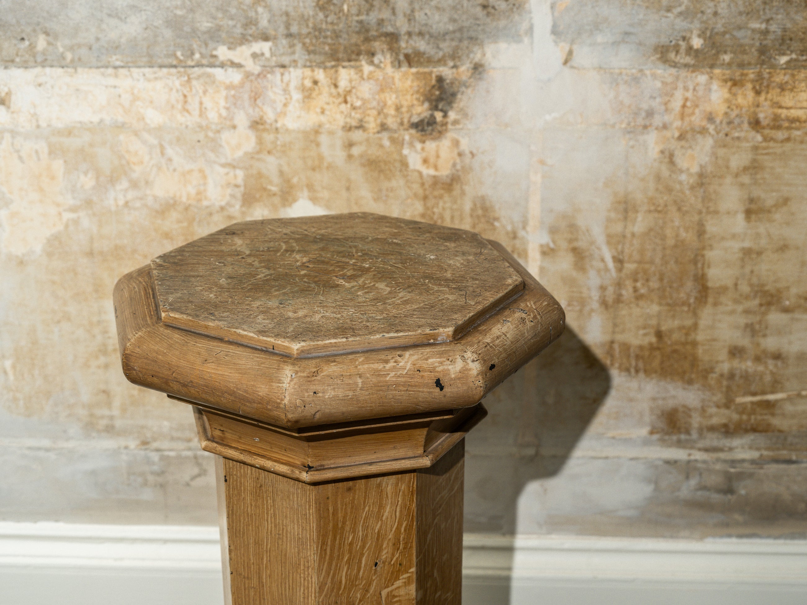 A Faux Oak decorated Column Plinth