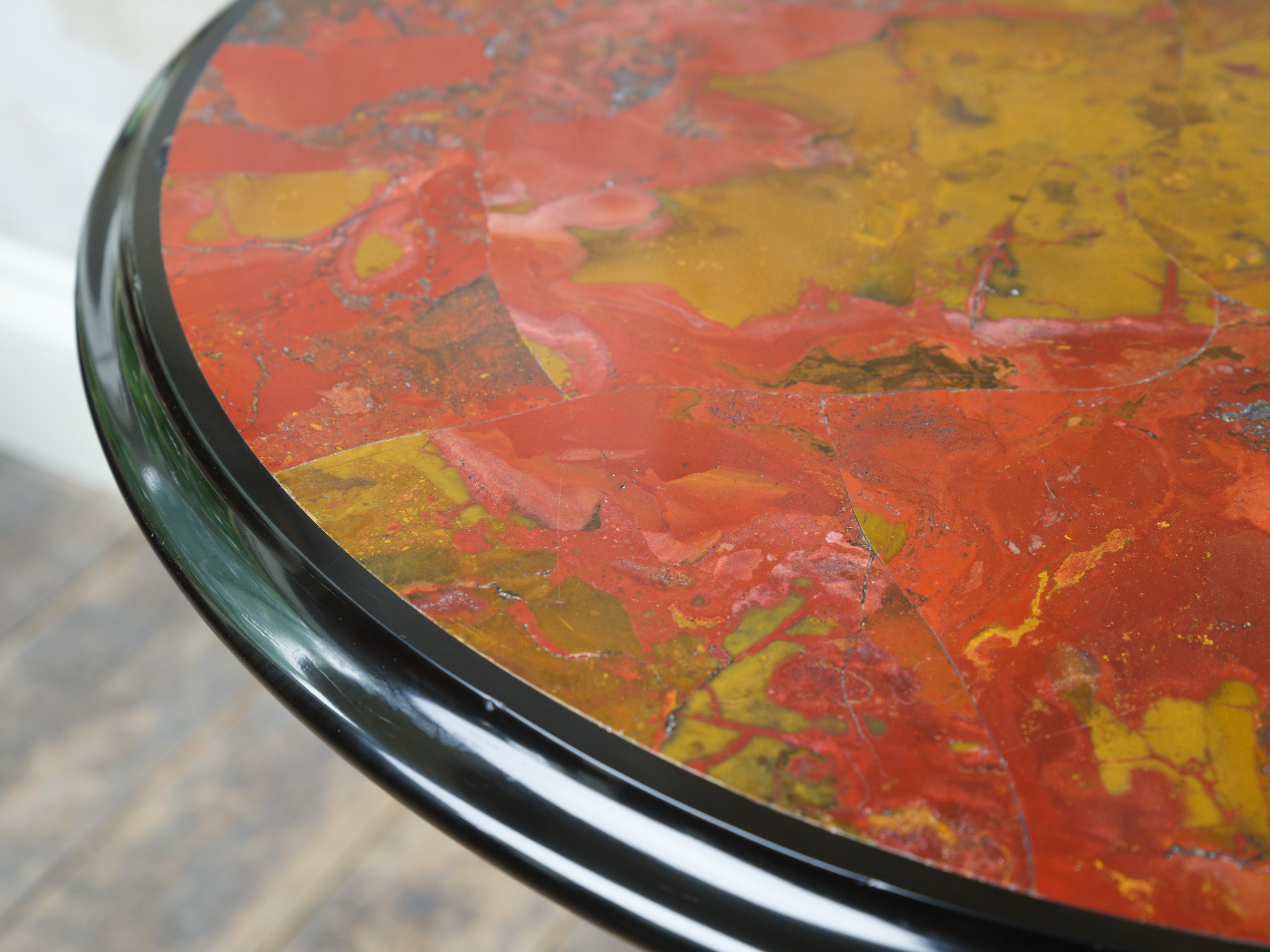 A Jasper & Ashford Marble Table by Woodruff