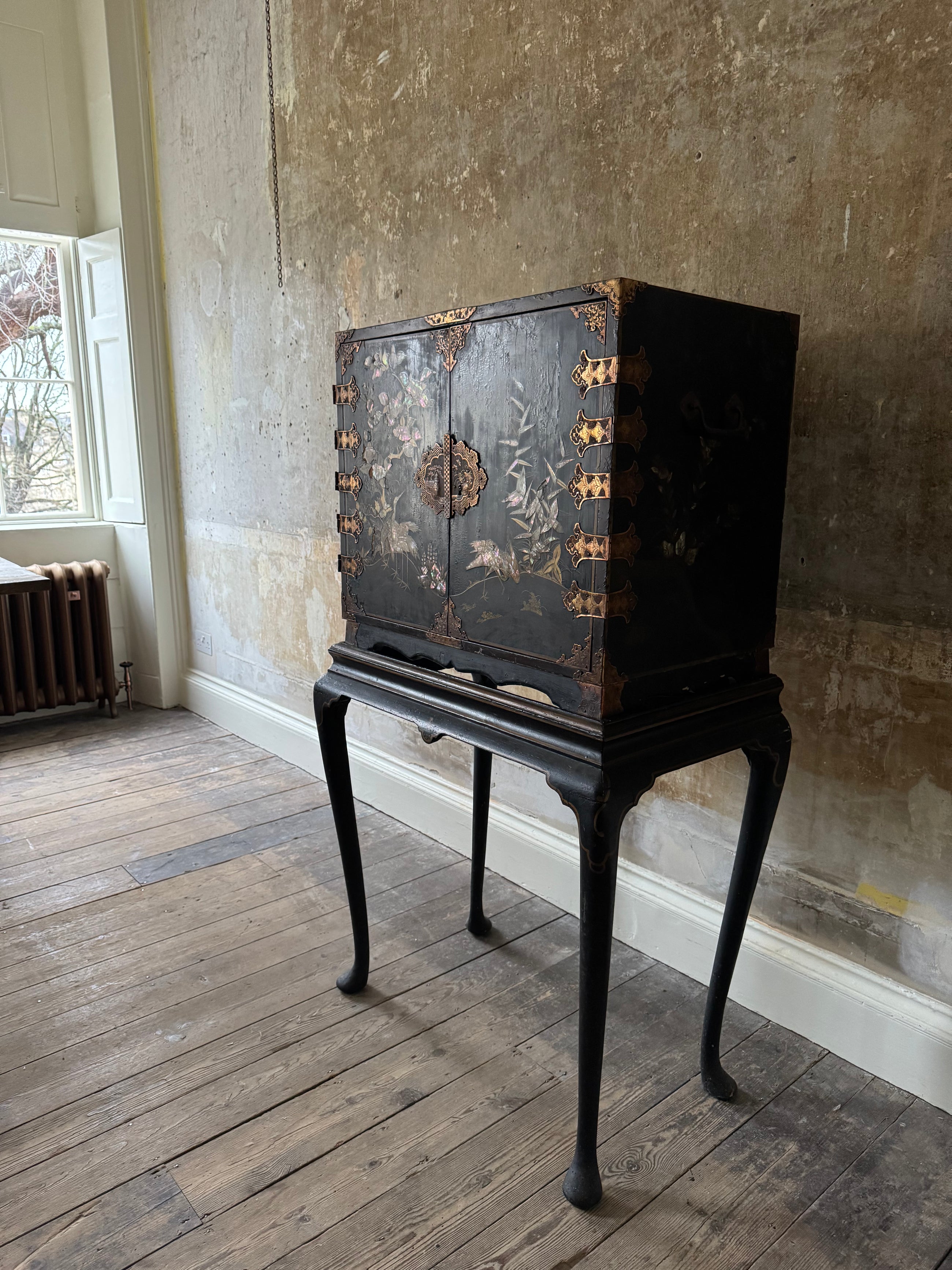 A Late 17th Century Japanese Export Cabinet on 18th Century English Stand