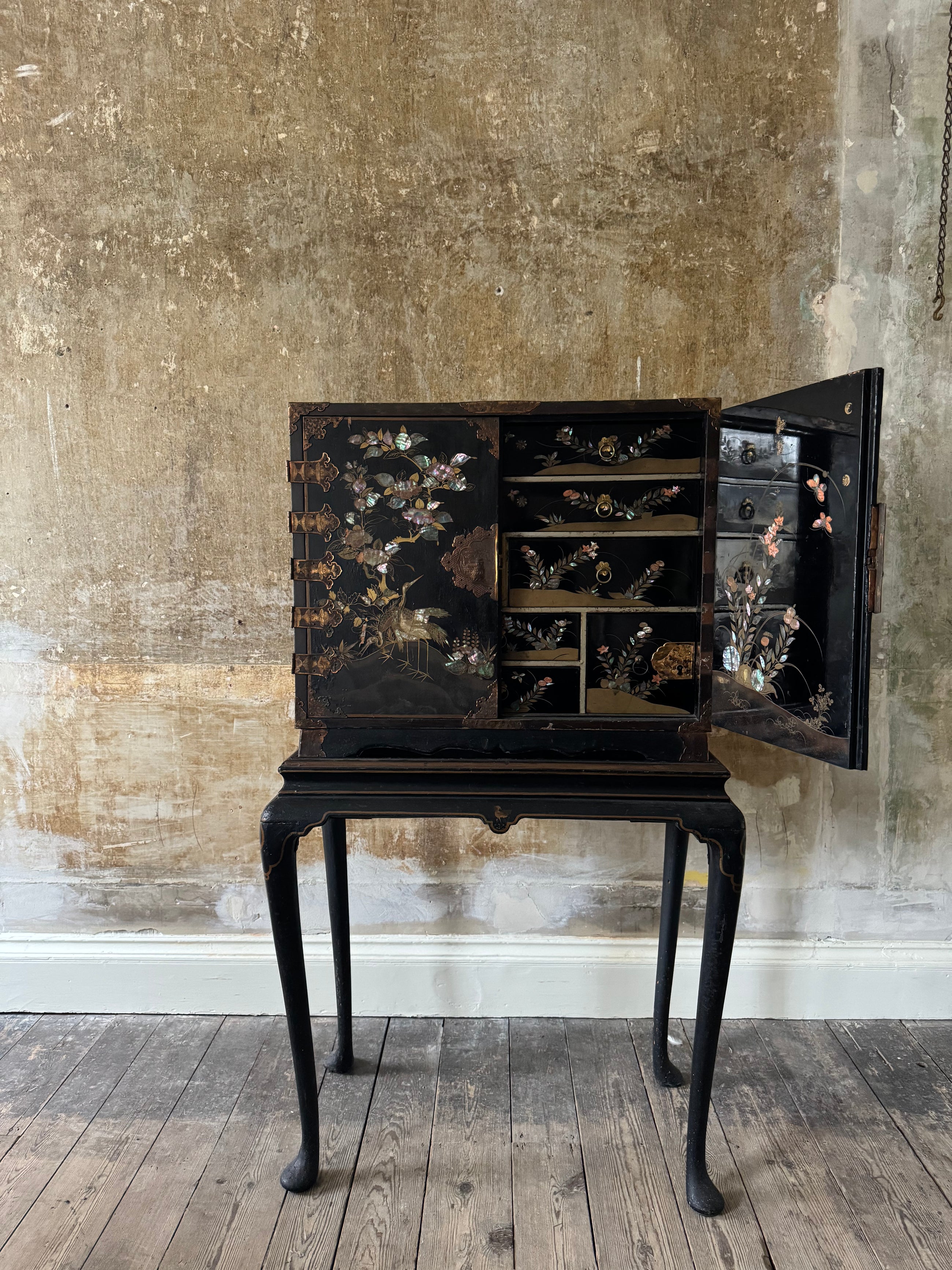 A Late 17th Century Japanese Export Cabinet on 18th Century English Stand