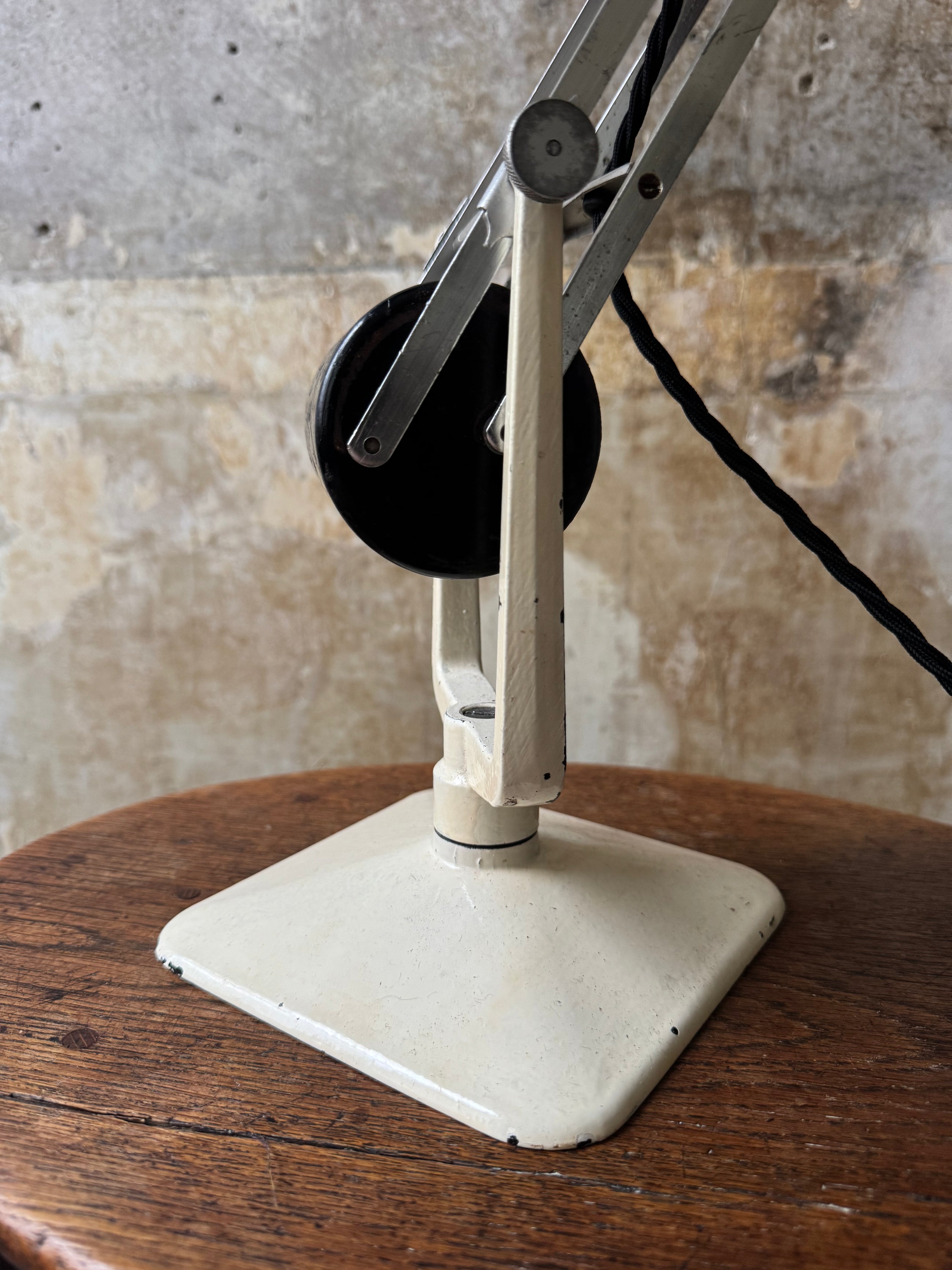 A Cream & Black H & H Desk Light