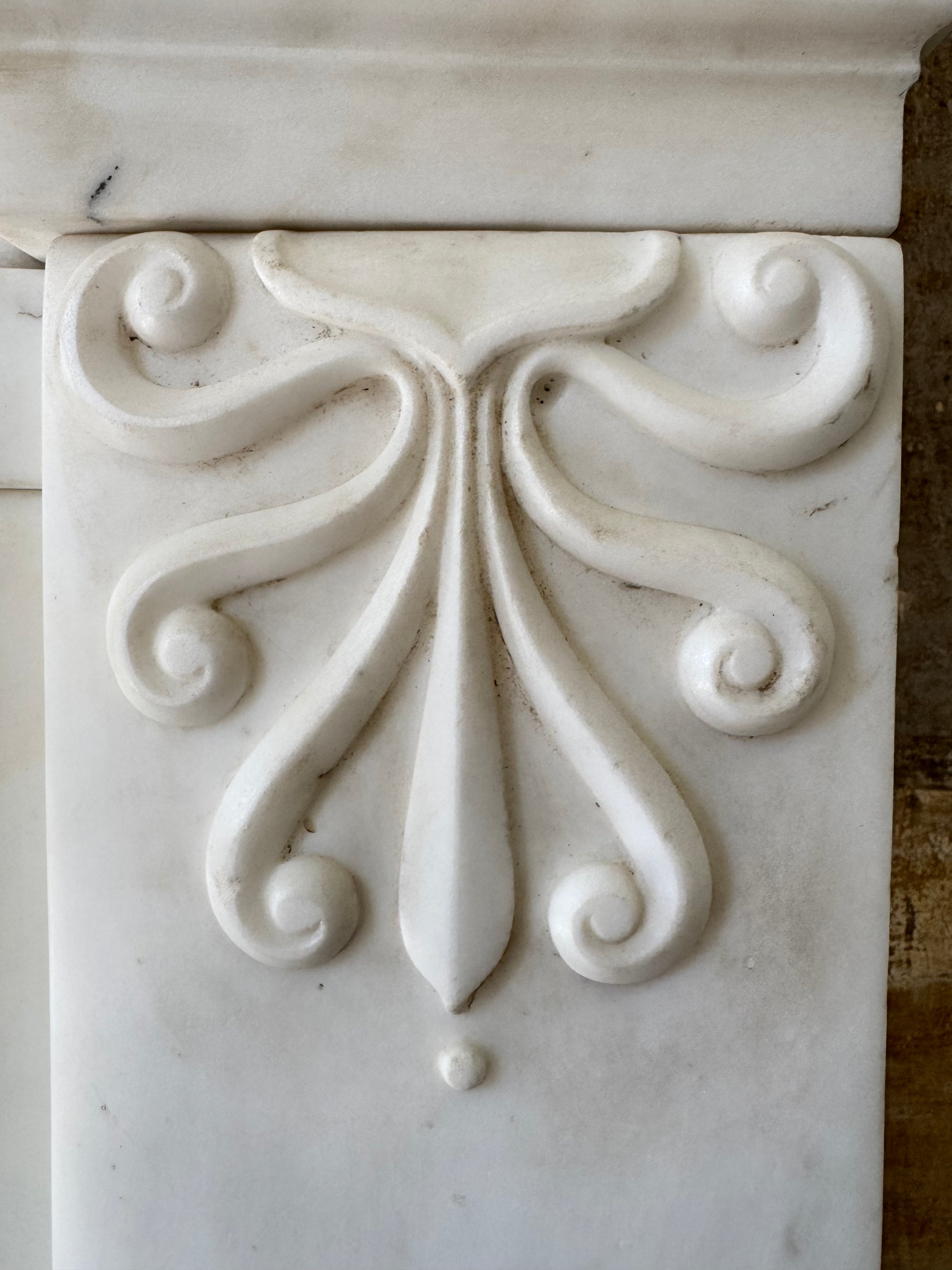 A Regency Statuary Marble Chimneypiece