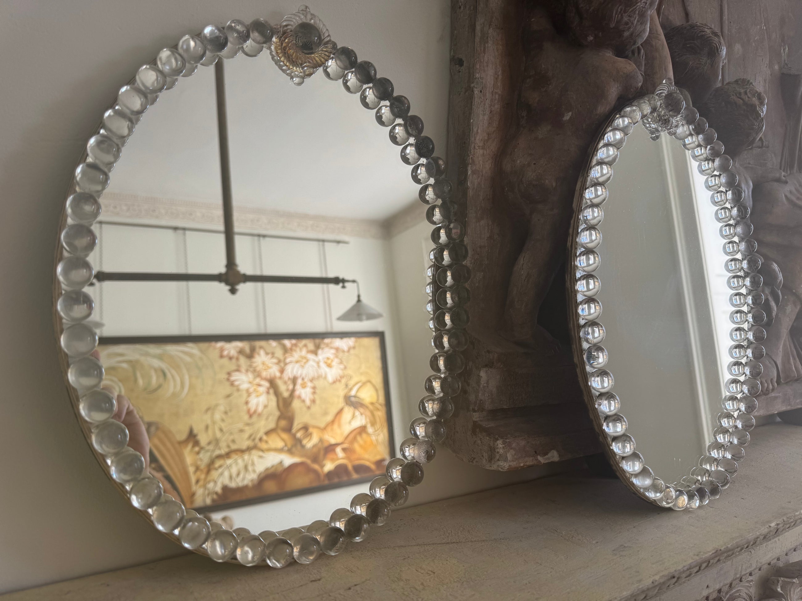 A Pair of Oval Glass Sphere Mirrors
