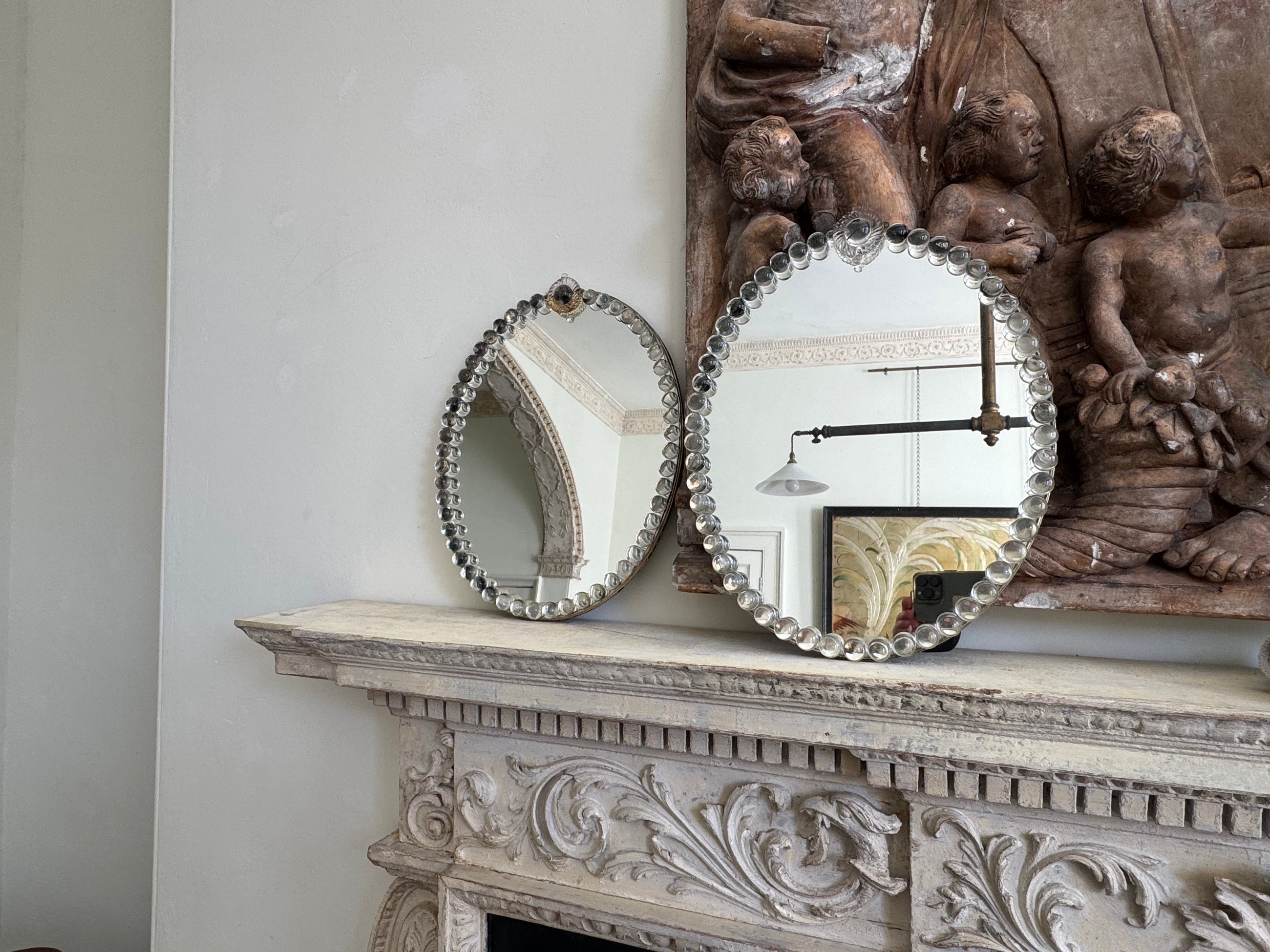 A Pair of Oval Glass Sphere Mirrors